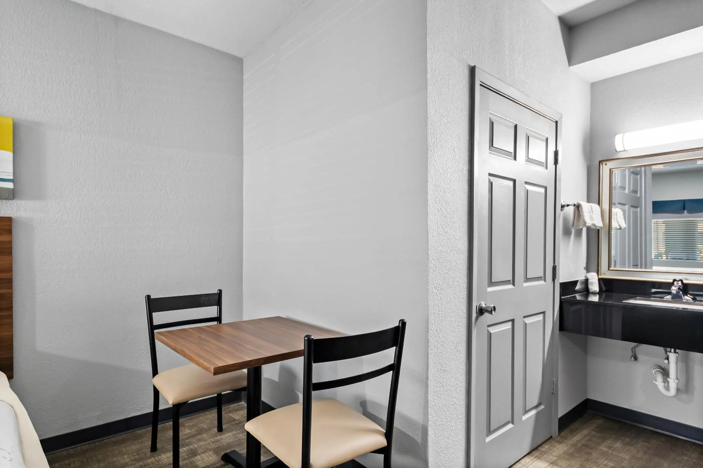 Photo of the whole room in HomeTowne Studios by Red Roof San Antonio E - Frost Bank Center