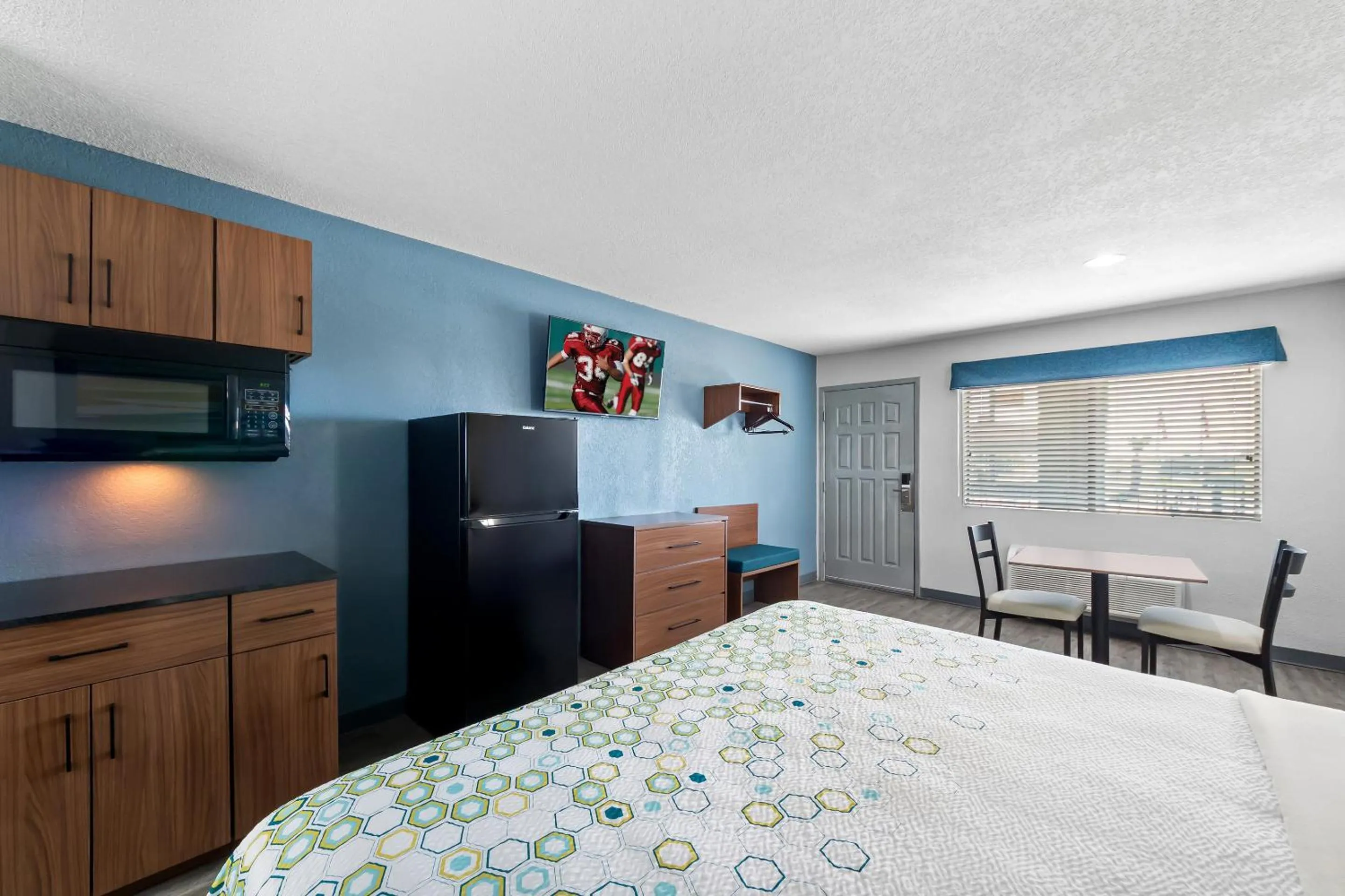 Photo of the whole room, Bed in HomeTowne Studios by Red Roof San Antonio E - Frost Bank Center