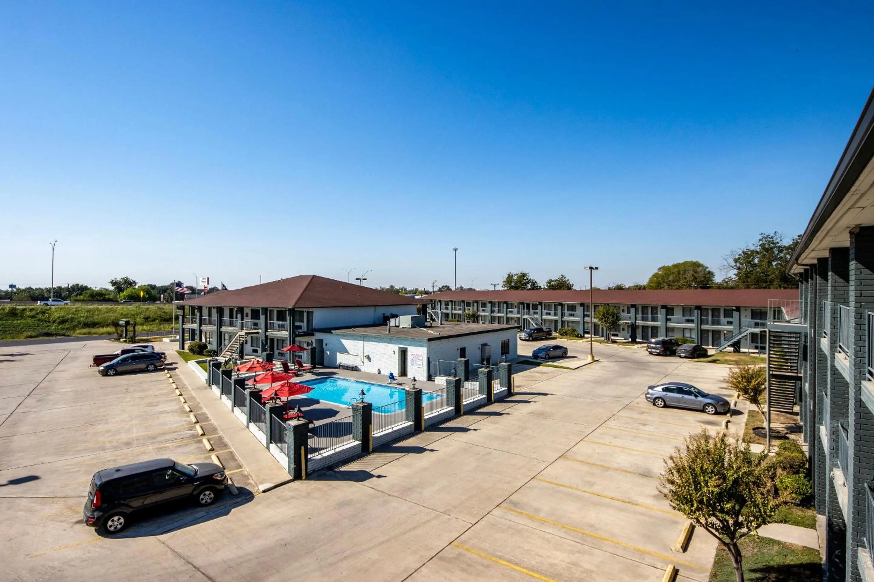 Property building in HomeTowne Studios by Red Roof San Antonio E - Frost Bank Center