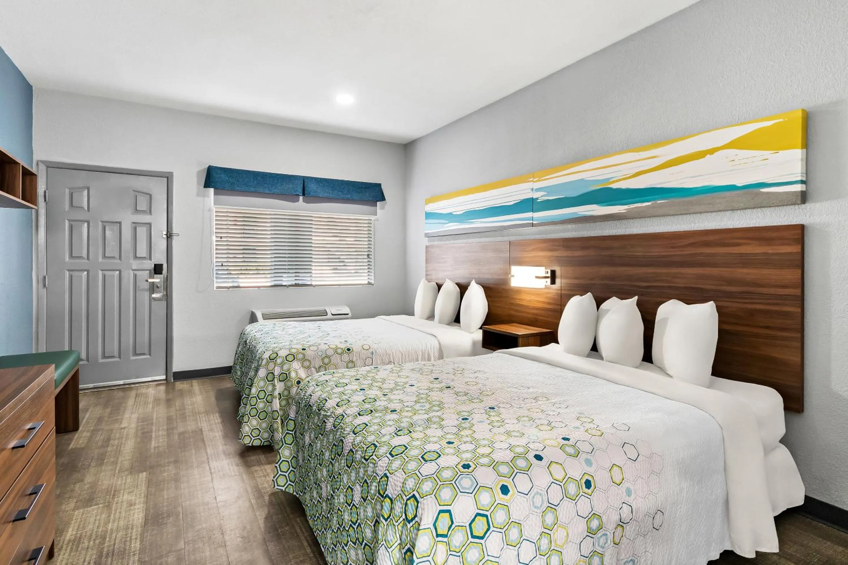 Photo of the whole room, Bed in HomeTowne Studios by Red Roof San Antonio E - Frost Bank Center