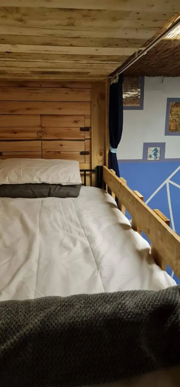 Bed in Sunset beach backpackers