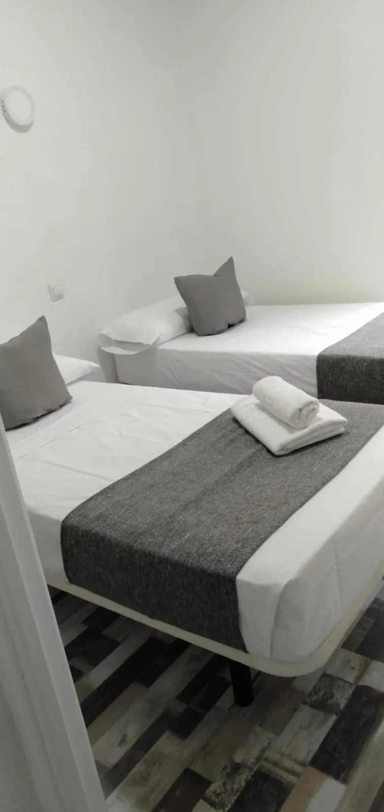 Bed in HOSTAL Noche y Dia