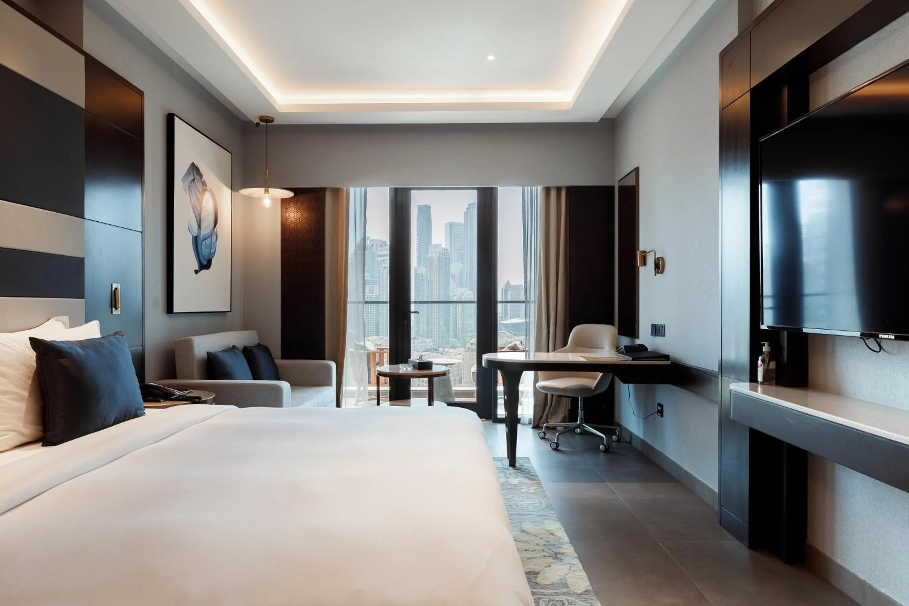 Bed in Ramee Dream Hotel Downtown