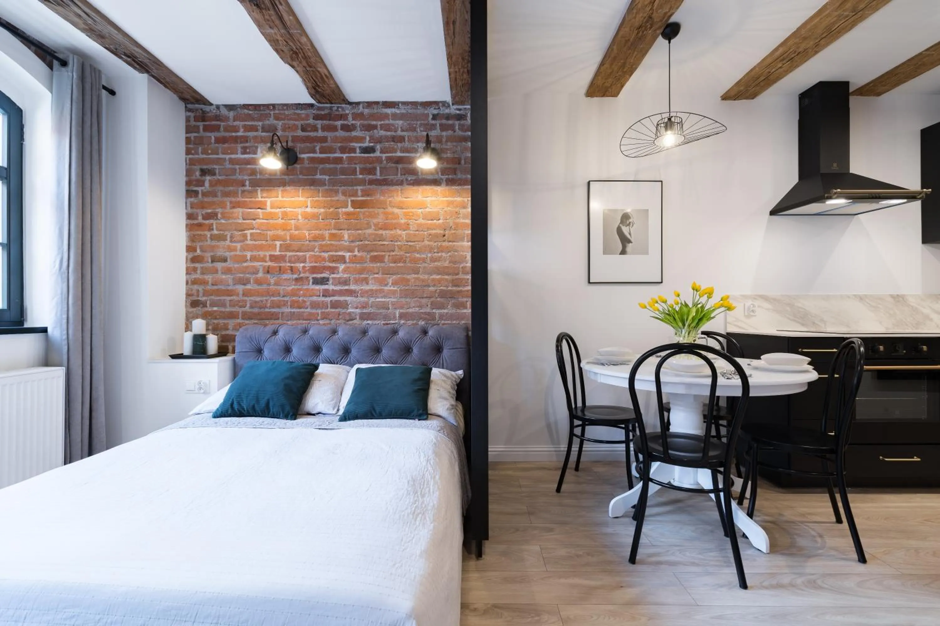 Bedroom, Bed in Miodowa Faktoria #7 by Rentoom