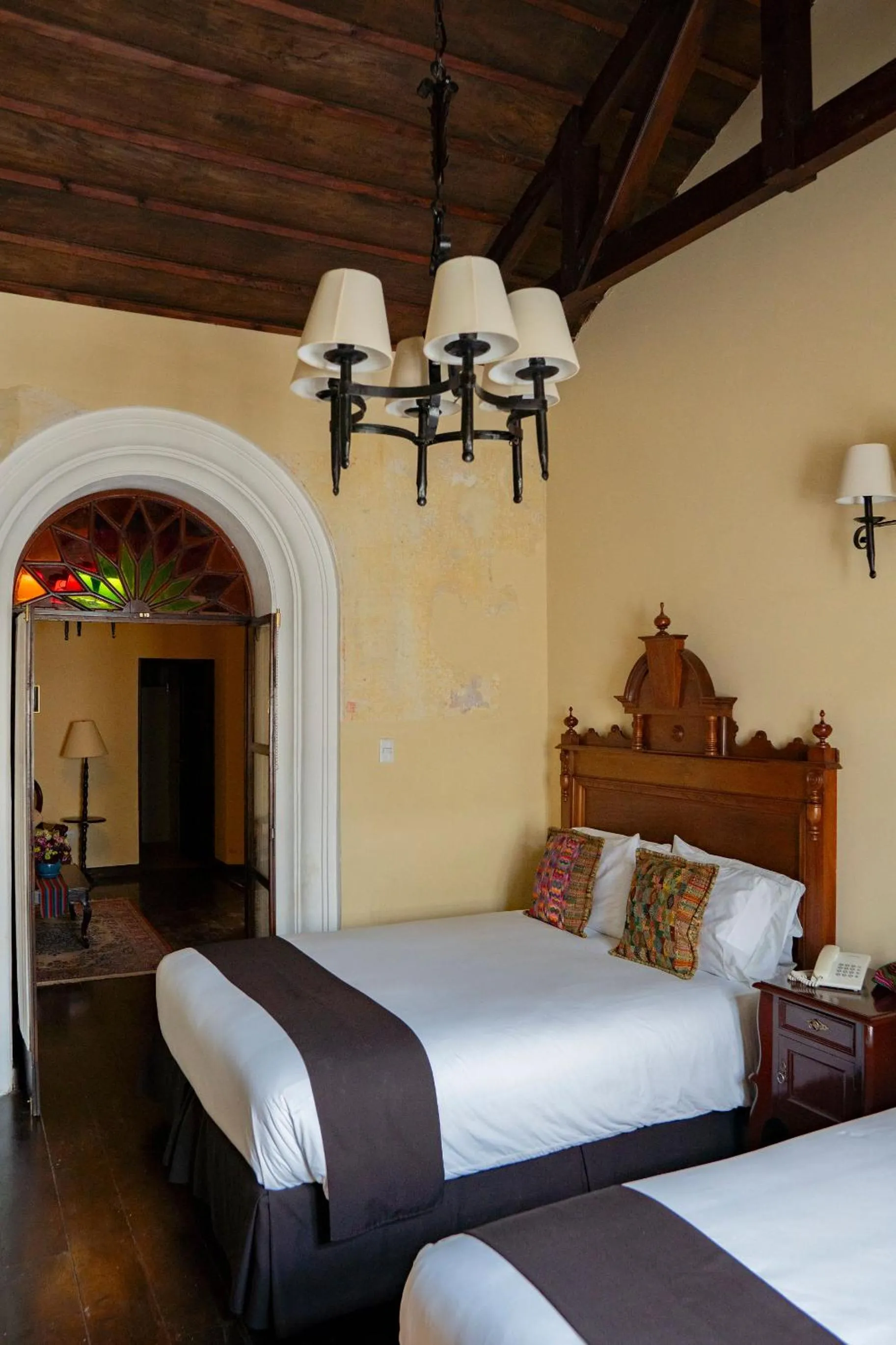 Bed in Casa Noble Hotel