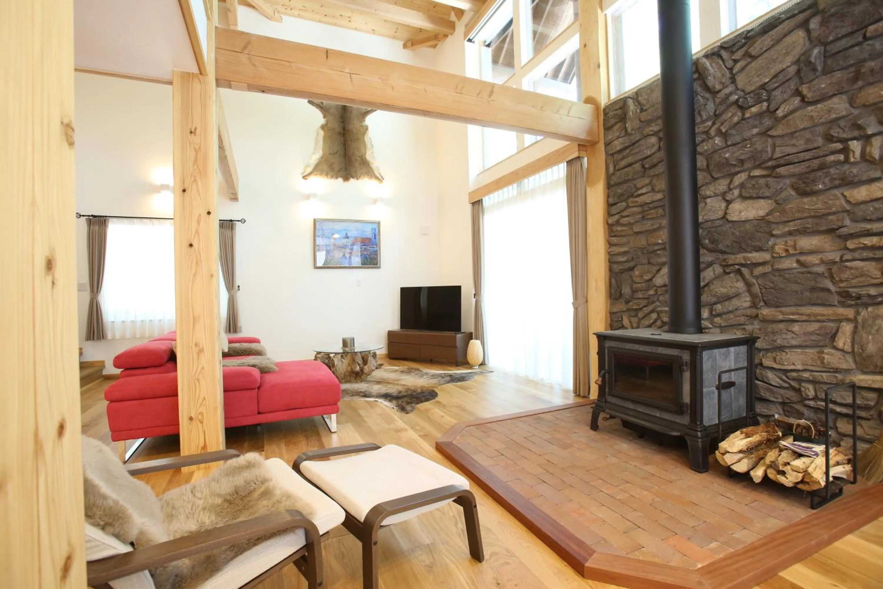 Living room in Villa Bavaria by Hakuba White Fox Company