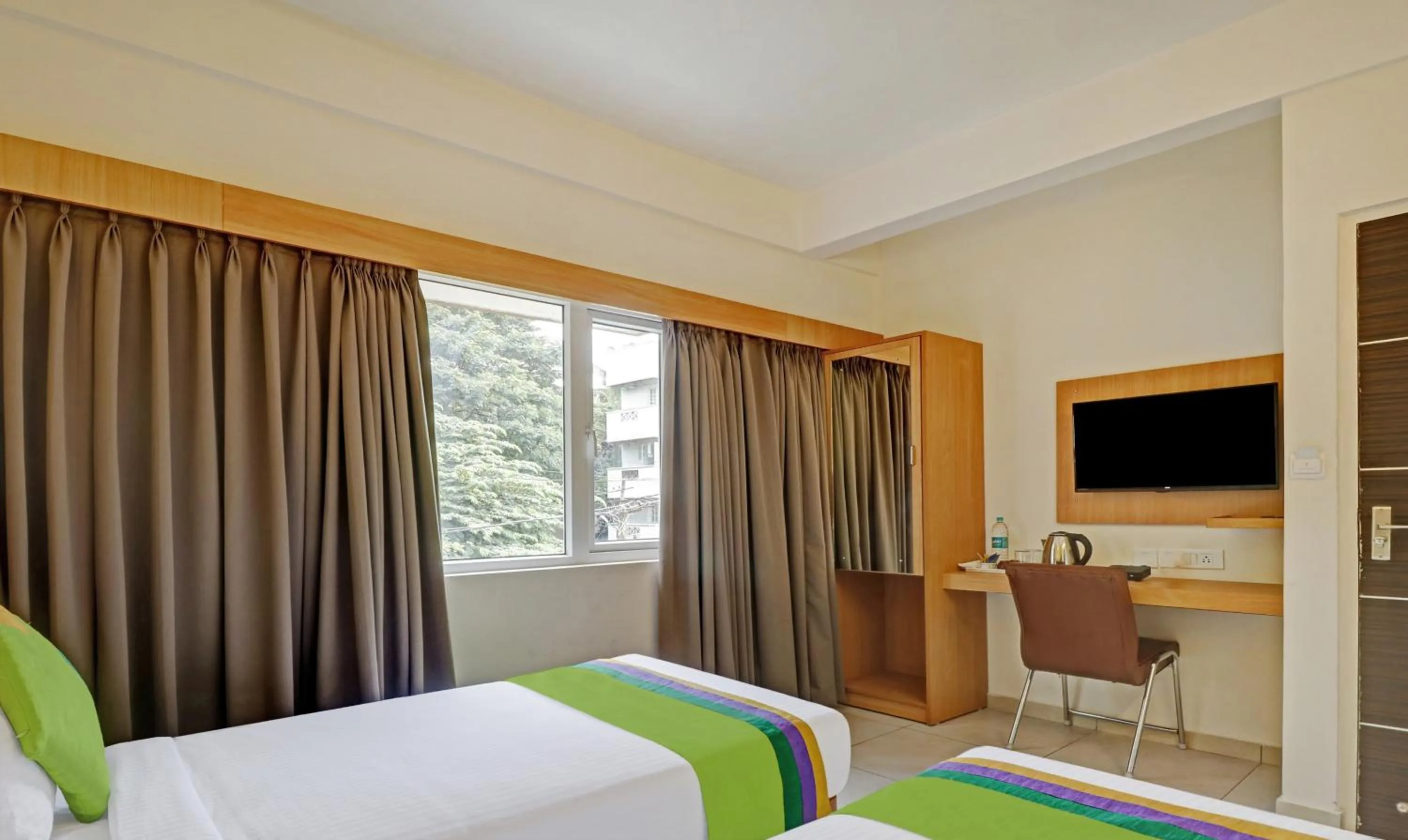 Bedroom, Bed in Treebo Fortune Stay