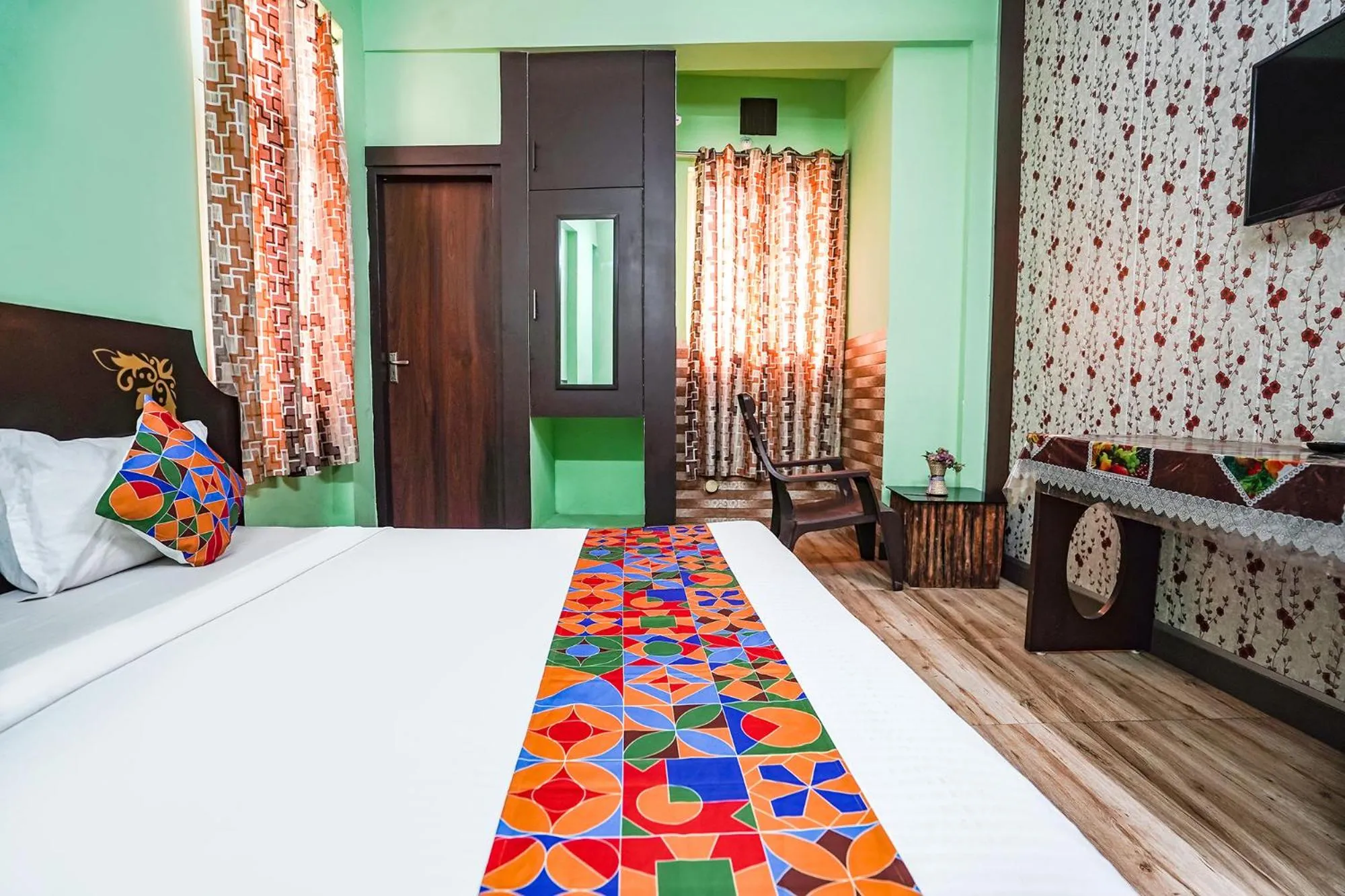 Bed in FabHotel Krishna Heights