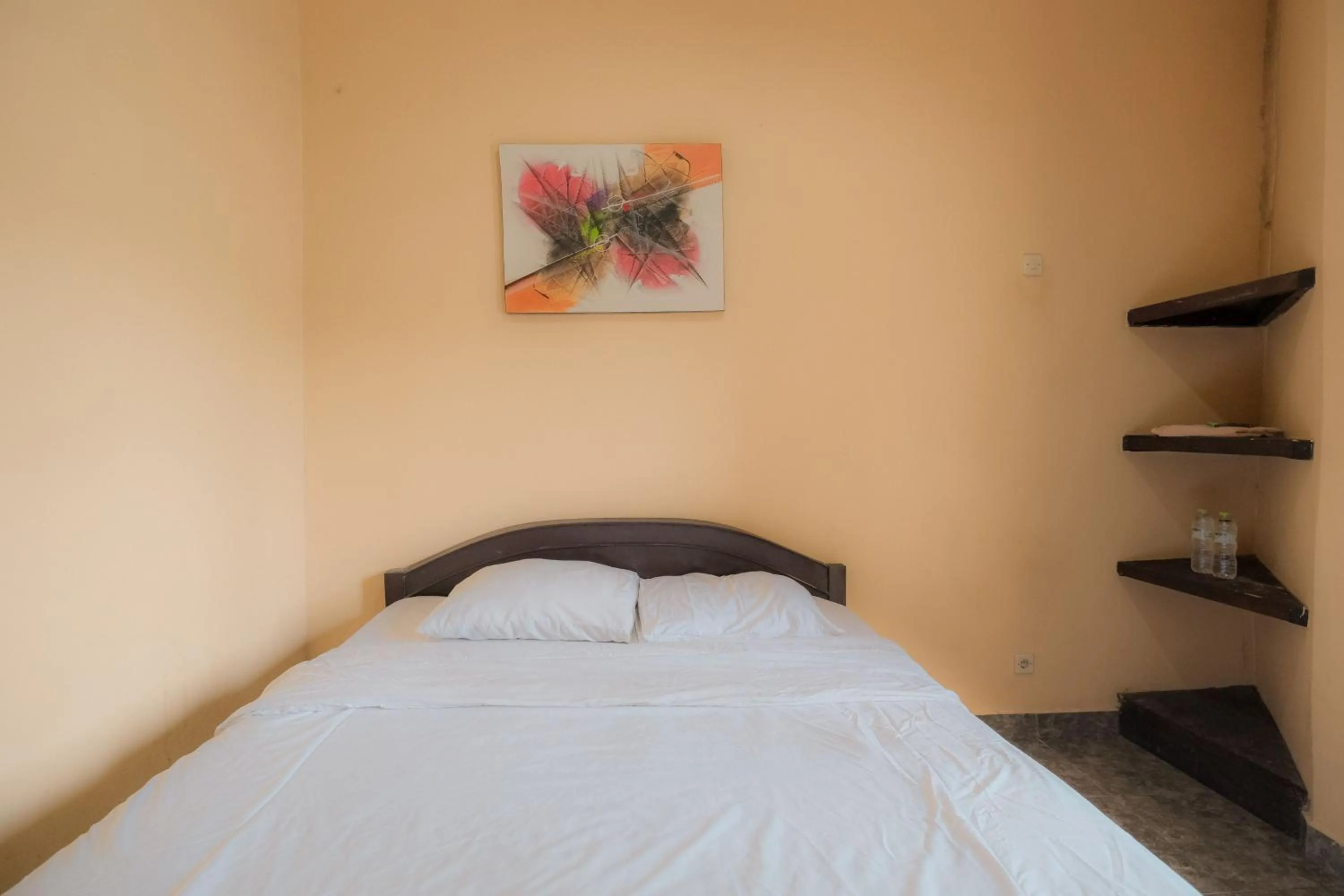 Bed in Pelangi Homestay Bedugul RedPartner