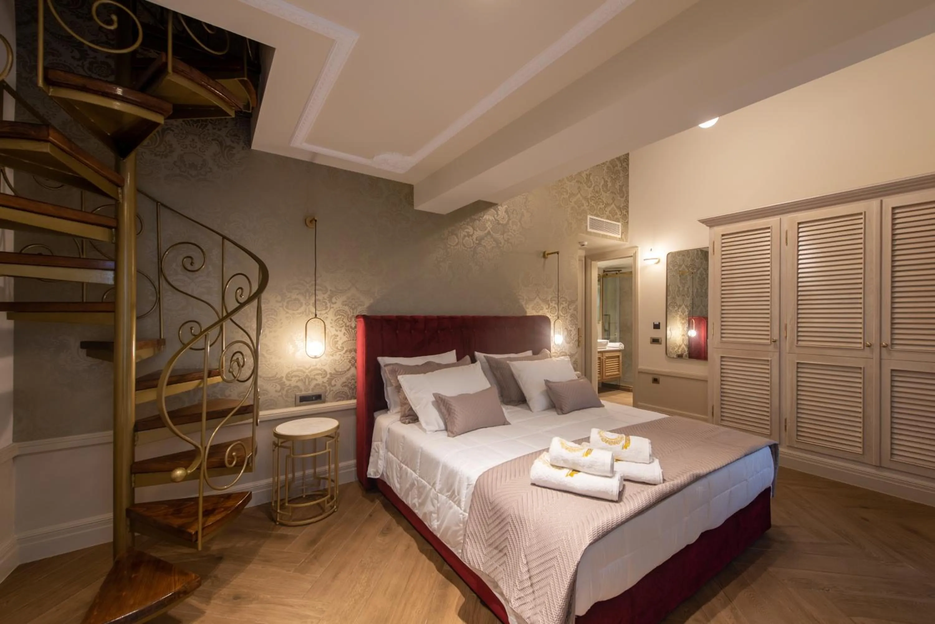Bed in Capolavoro Suites