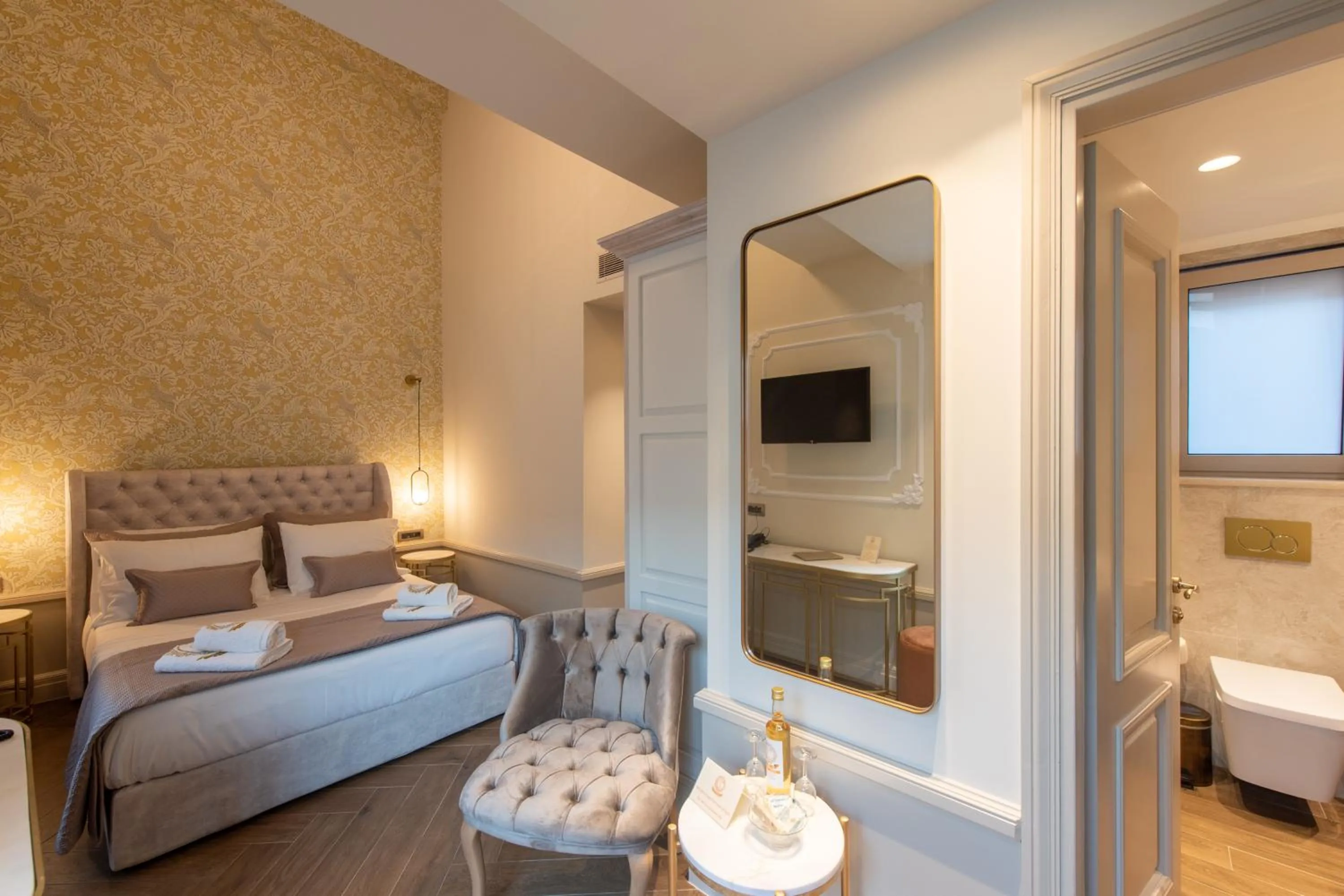 Bed in Capolavoro Suites