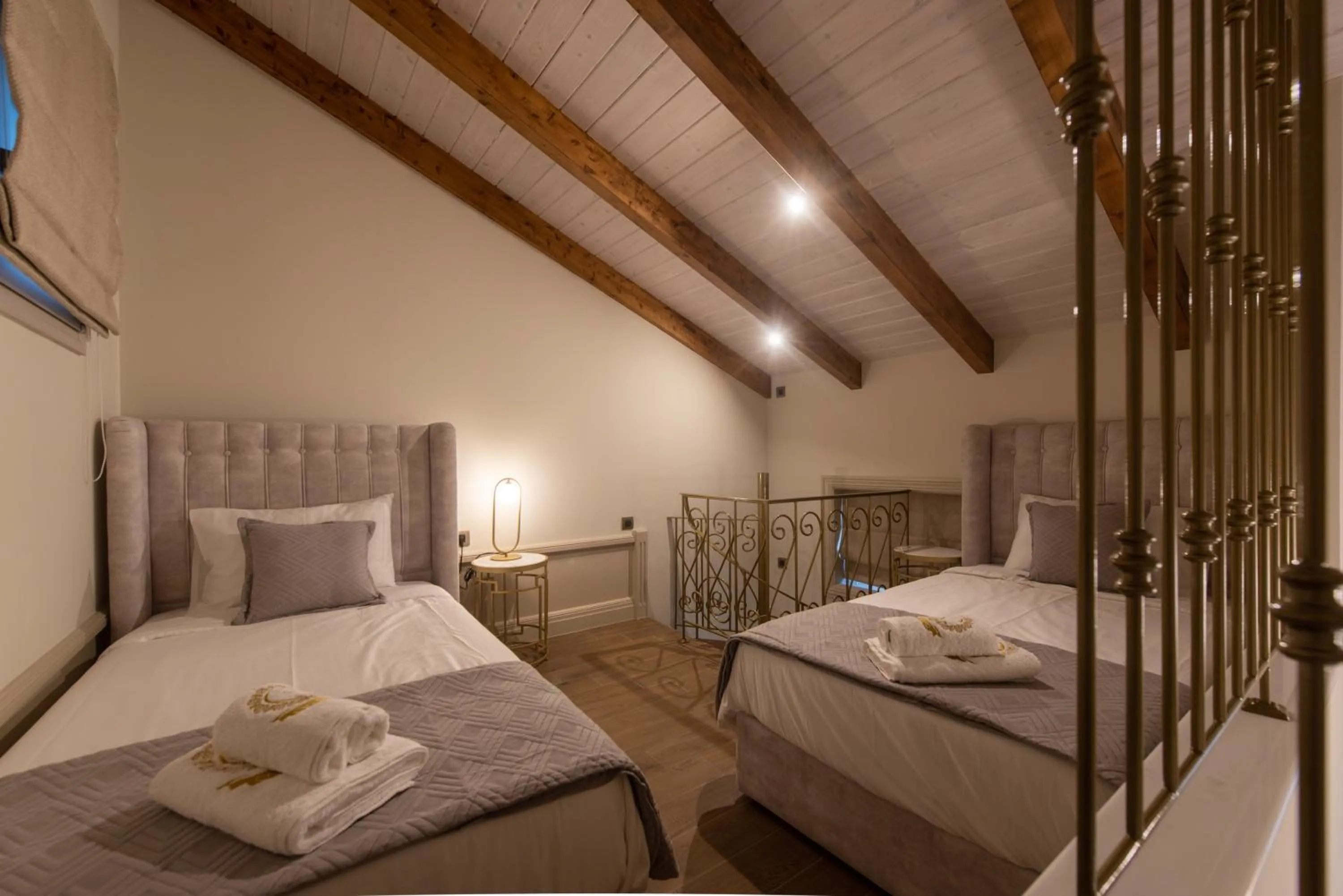 Bed in Capolavoro Suites