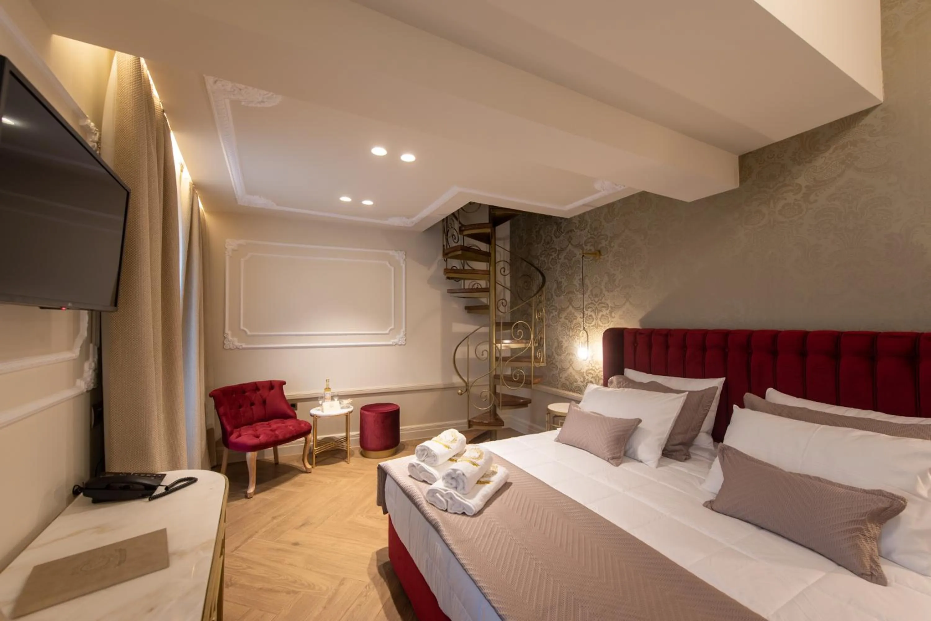 Bed in Capolavoro Suites