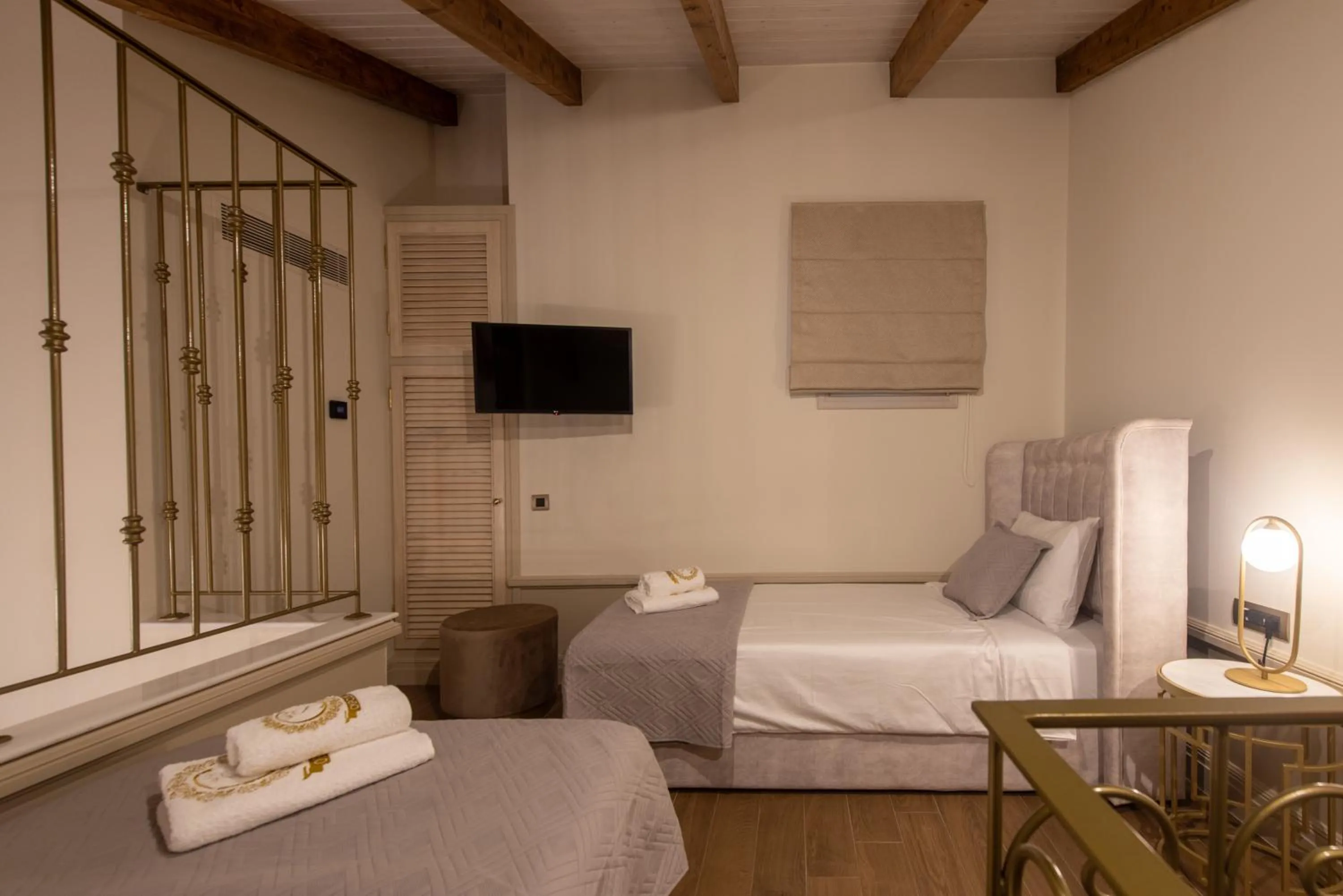 Bed in Capolavoro Suites