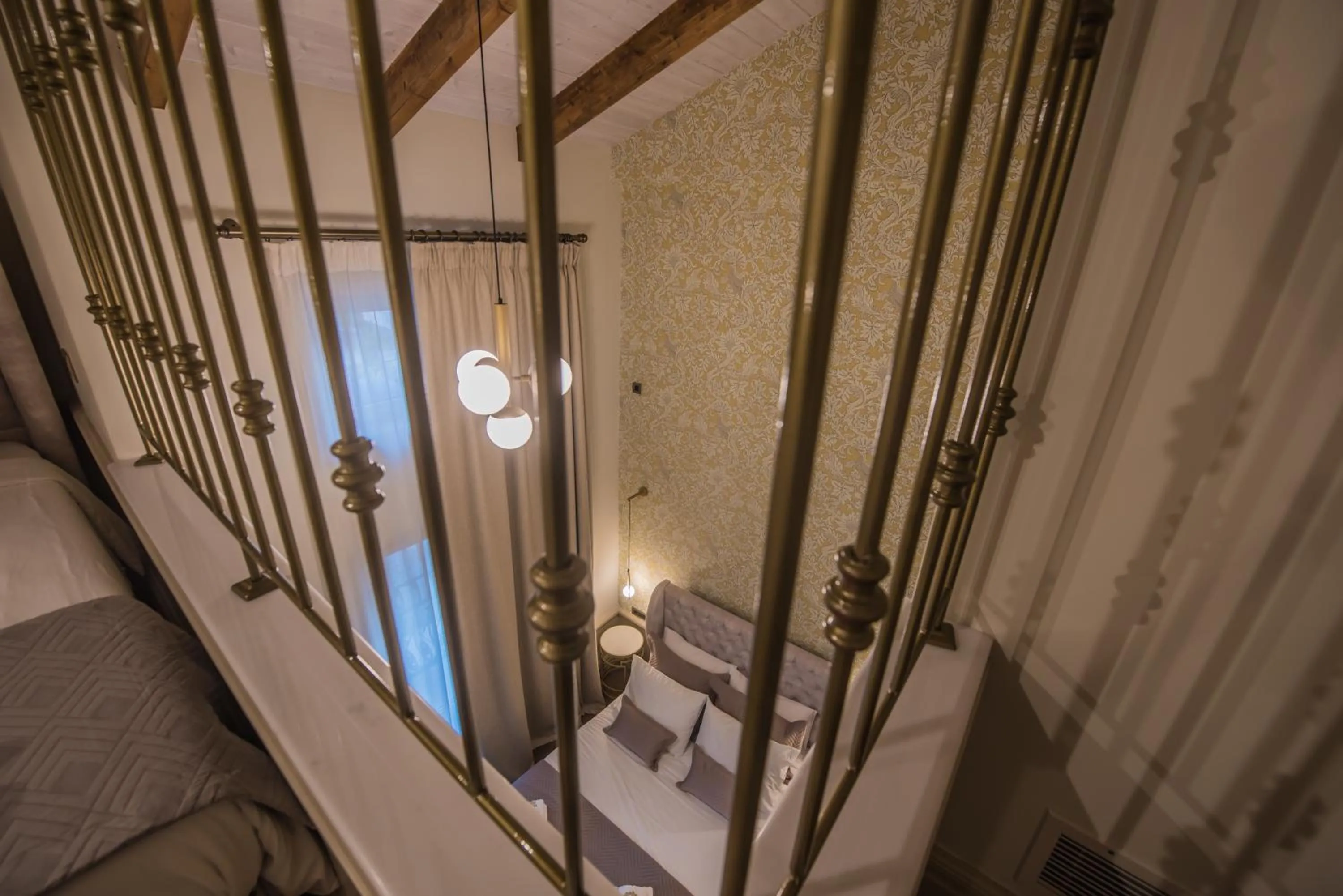 Bed in Capolavoro Suites