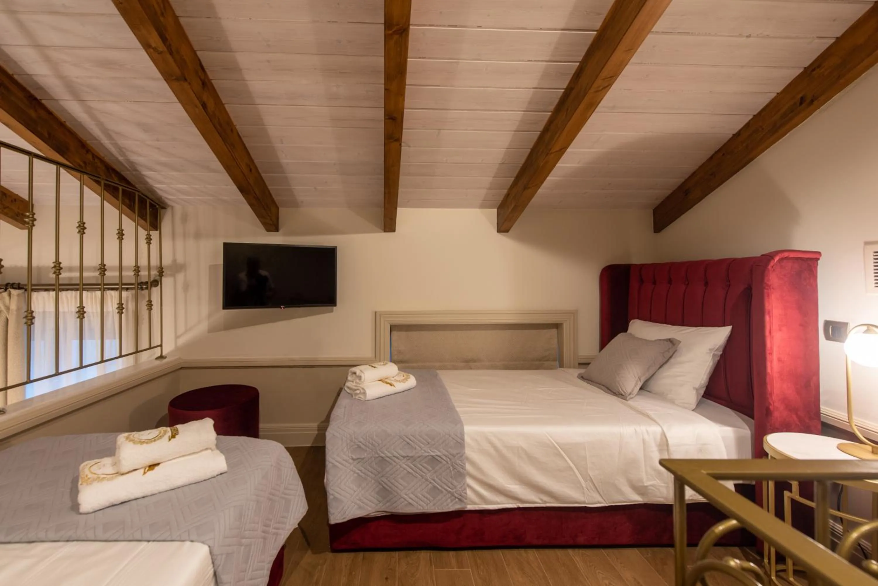 Bed in Capolavoro Suites