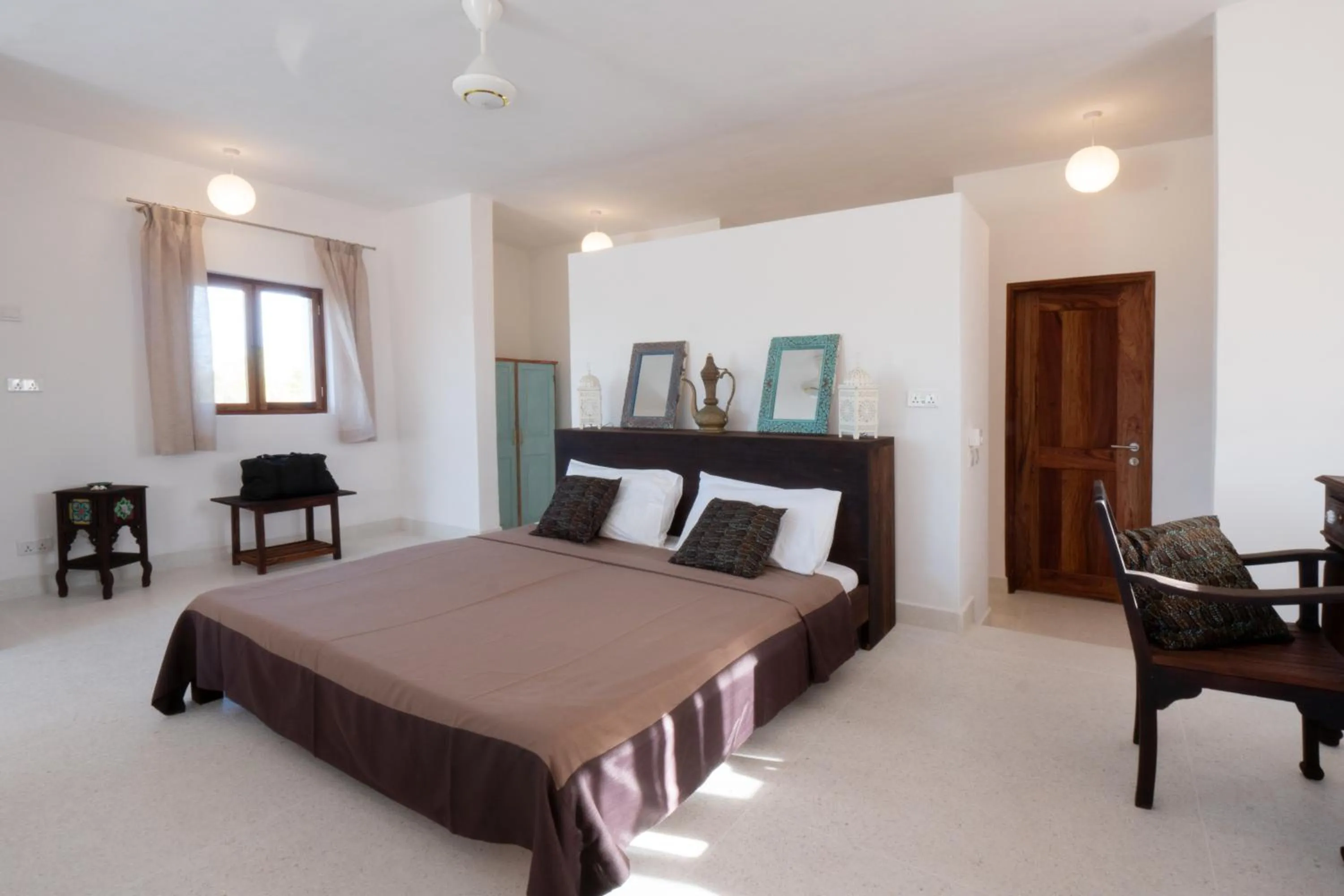 Bed in Amani Villas Nature Retreat