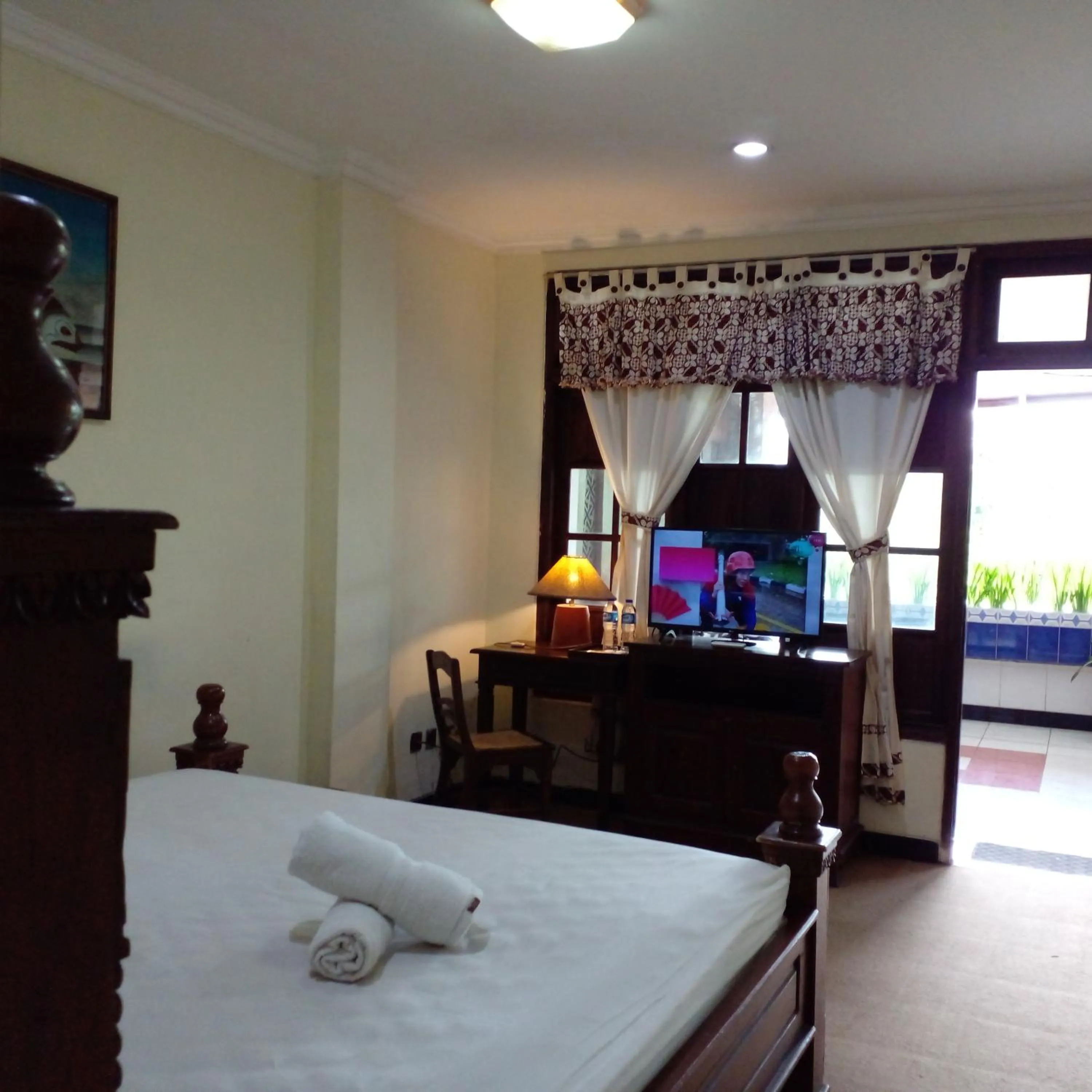 Photo of the whole room, Bed in Hotel Bifa Yogyakarta