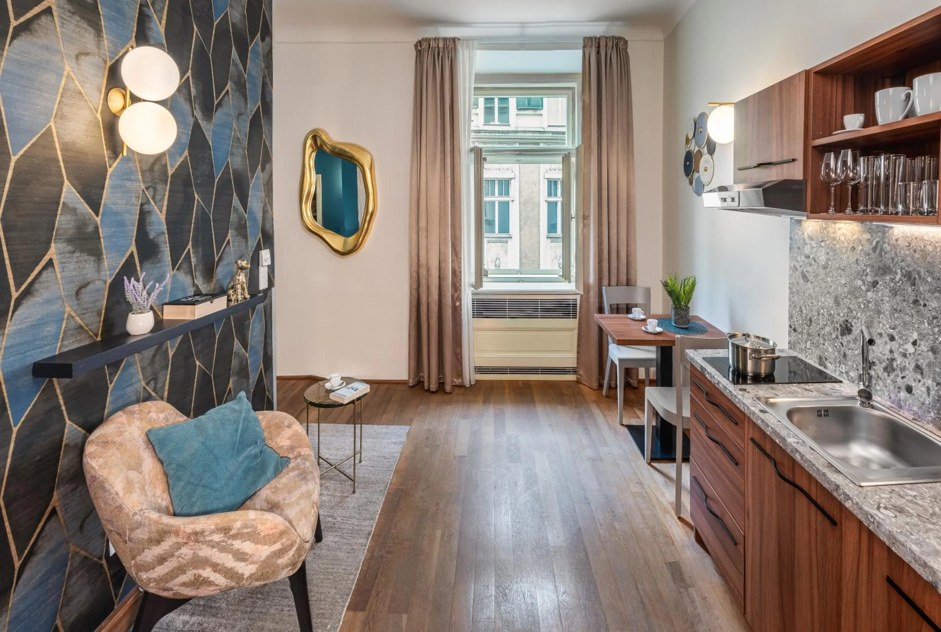 Kitchen or kitchenette in Golden Angel Suites by Adrez