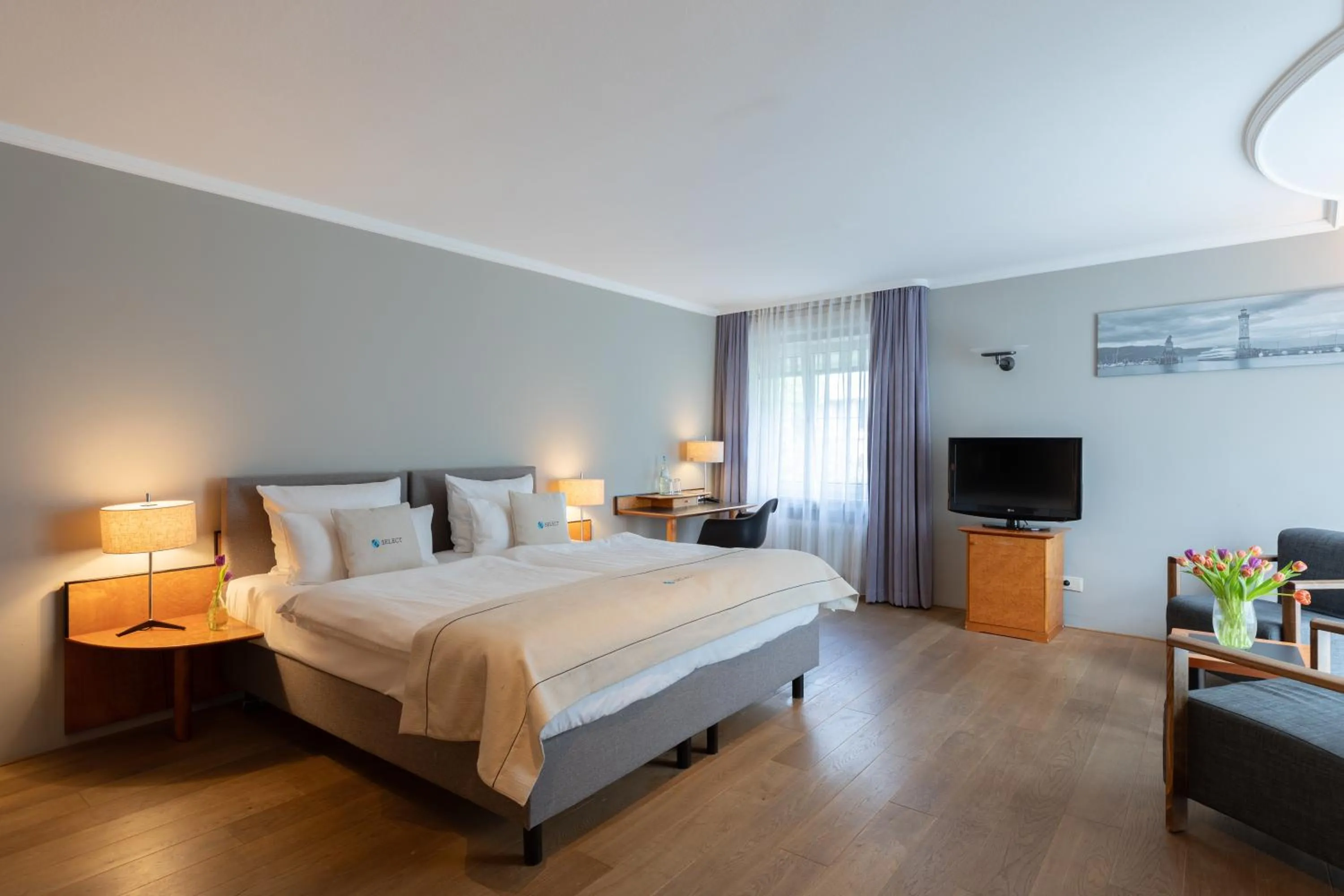 Bed in Select Hotel Friedrichshafen