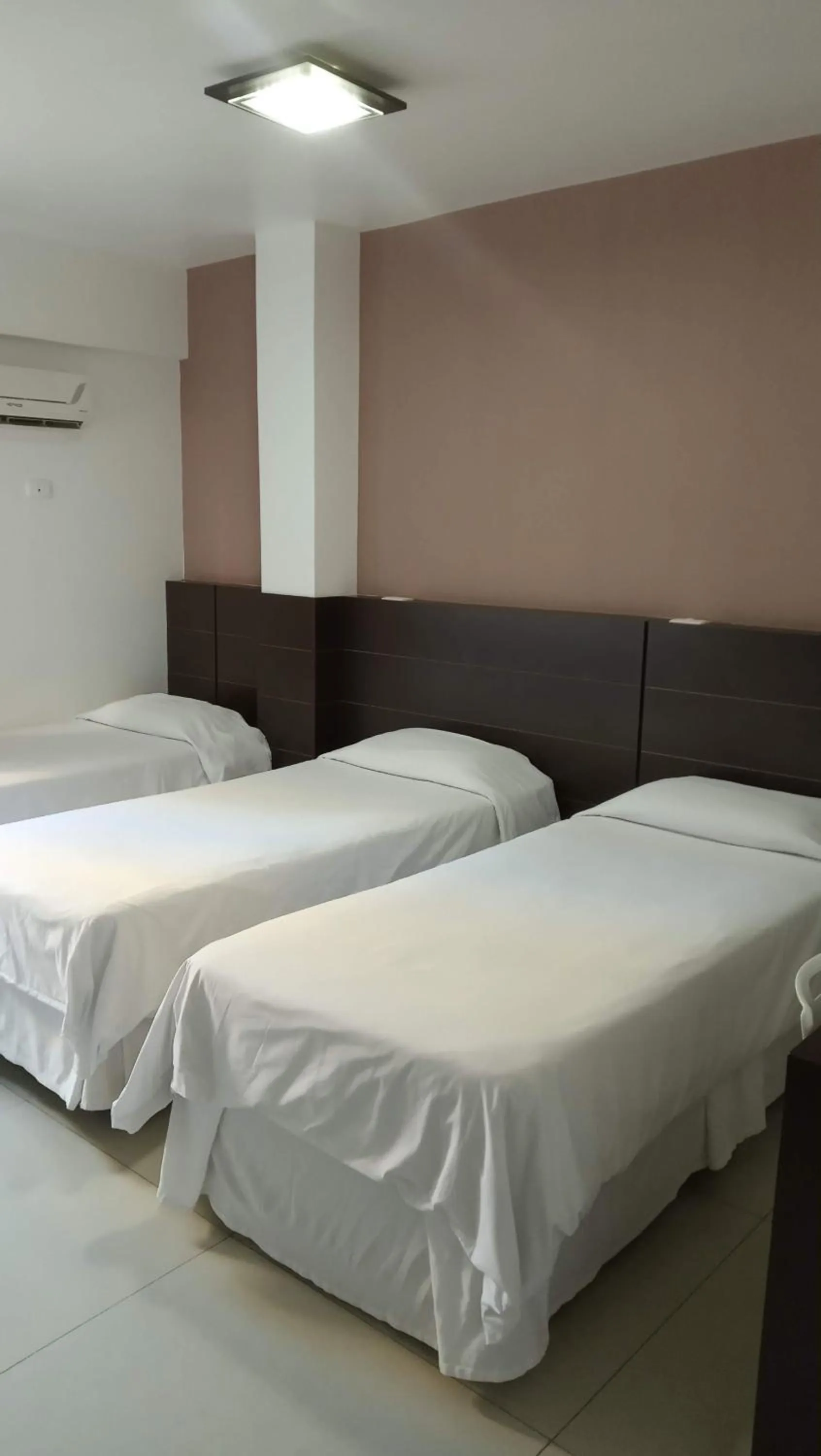 Bed in CLH Suítes Foz do Iguaçu