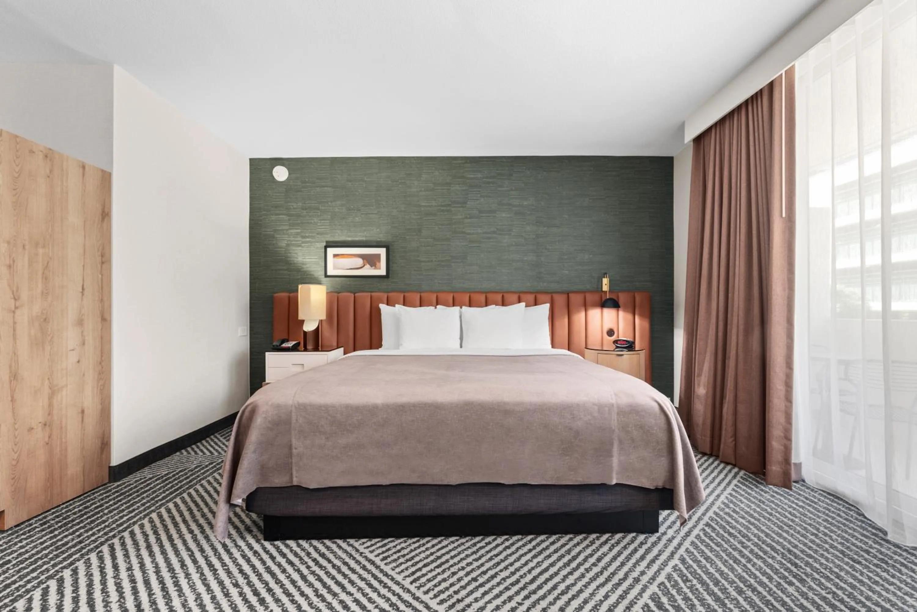 Bed in Royal Palace Westwood Hotel