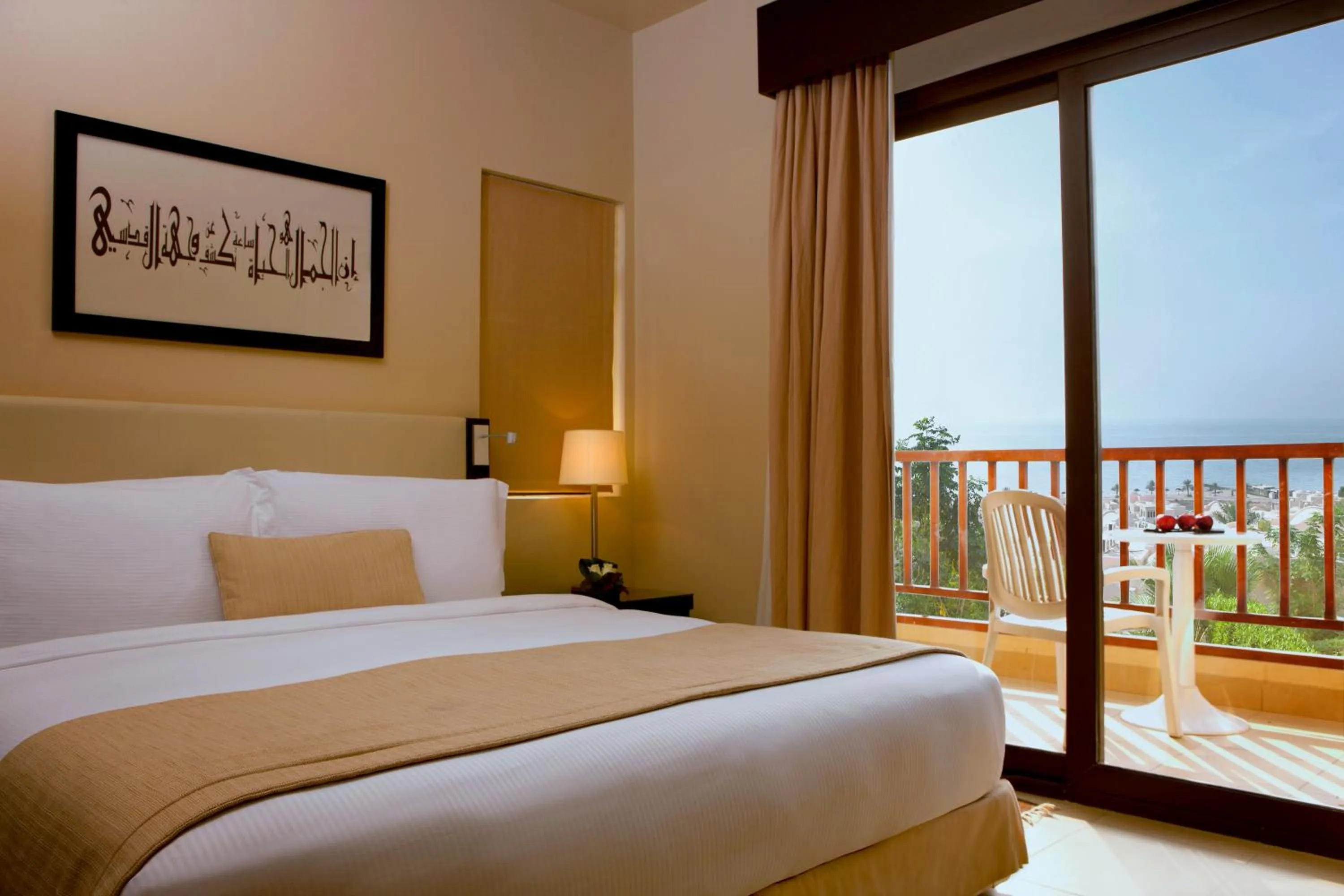 Balcony/Terrace, Bed in The Cove Rotana Resort - Ras Al Khaimah