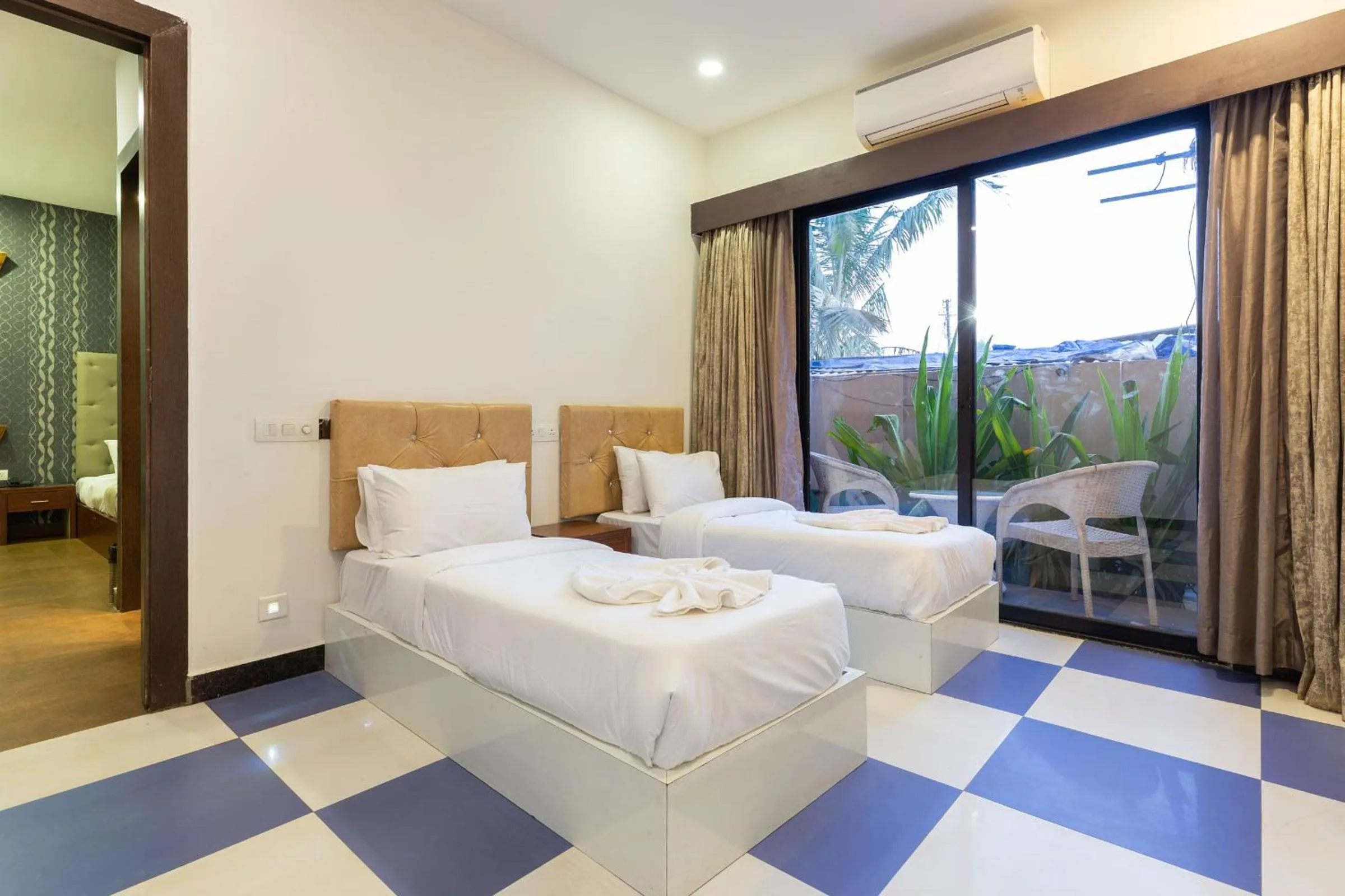 Photo of the whole room, Bed in Amara Oceanfront Resort & Club Baga