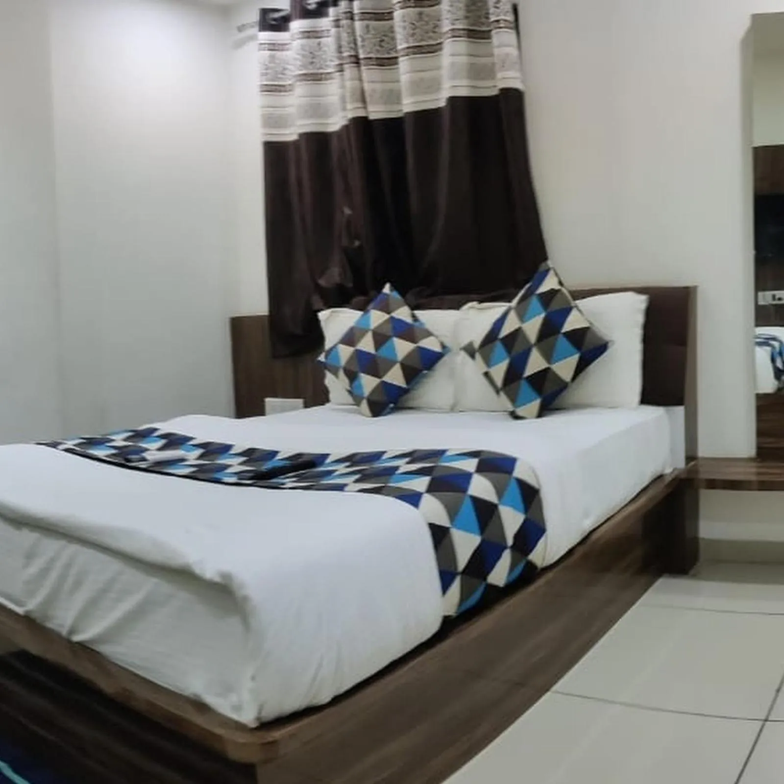 Bed in Hotel Mansarovar,Vadodara