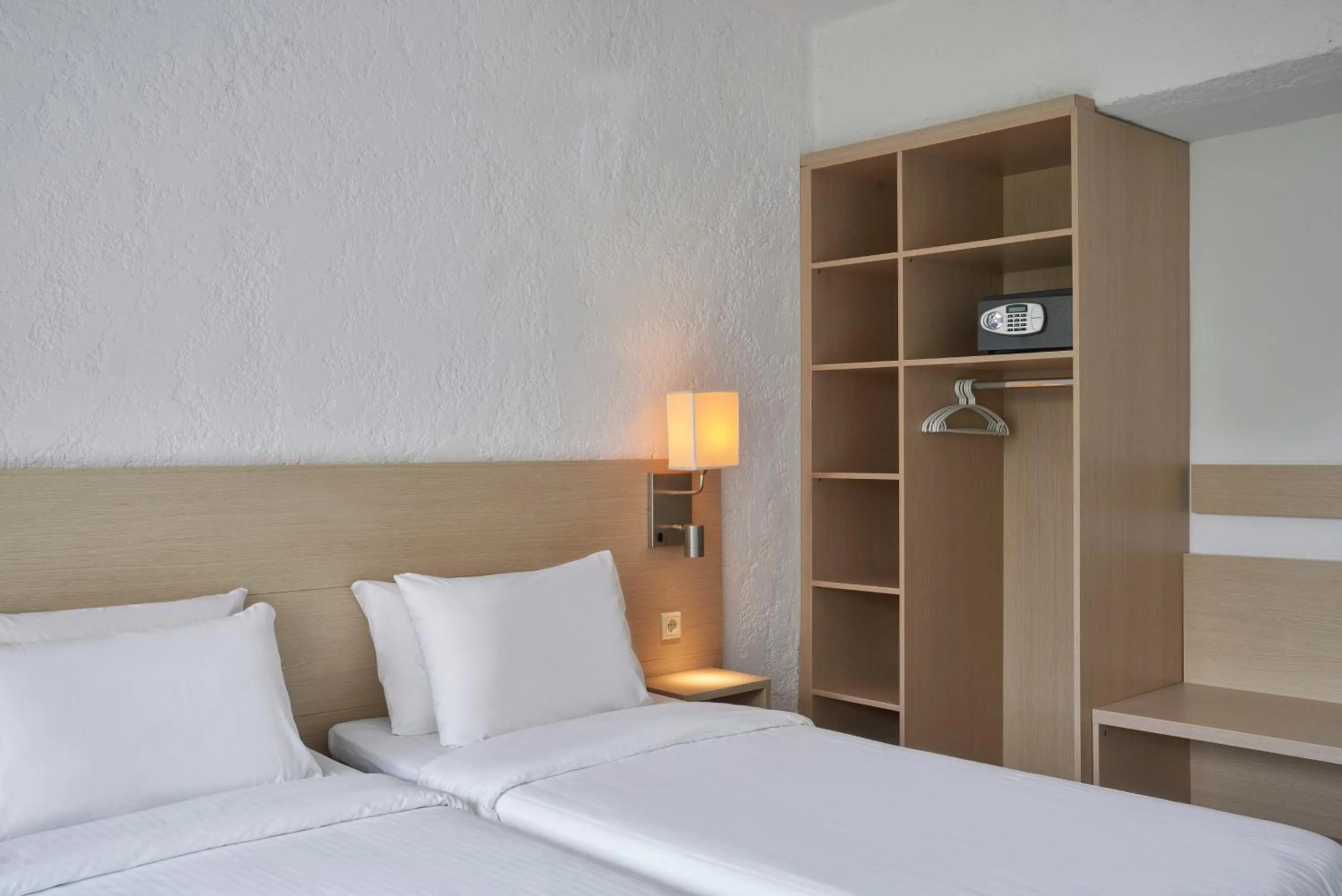 Bed in The Apartments by Esperia