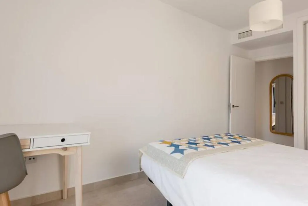 Bed in Carmela Suites Apartamento de dos dormitorios