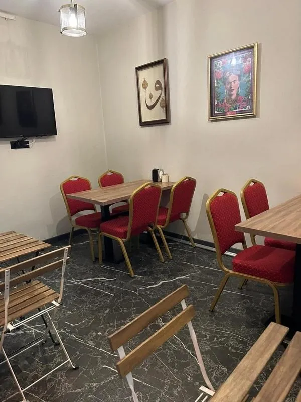 Communal lounge/ TV room in Meva Otel