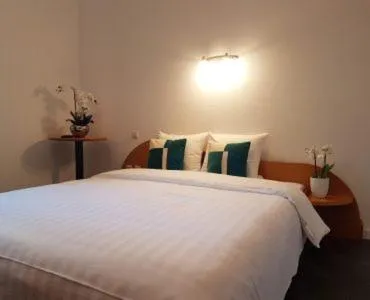 Bed in Hôtel La Charbonnade