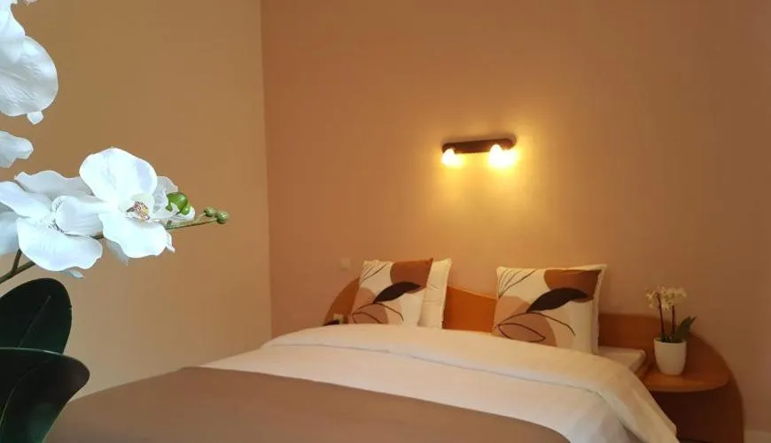 Bed in Hôtel La Charbonnade