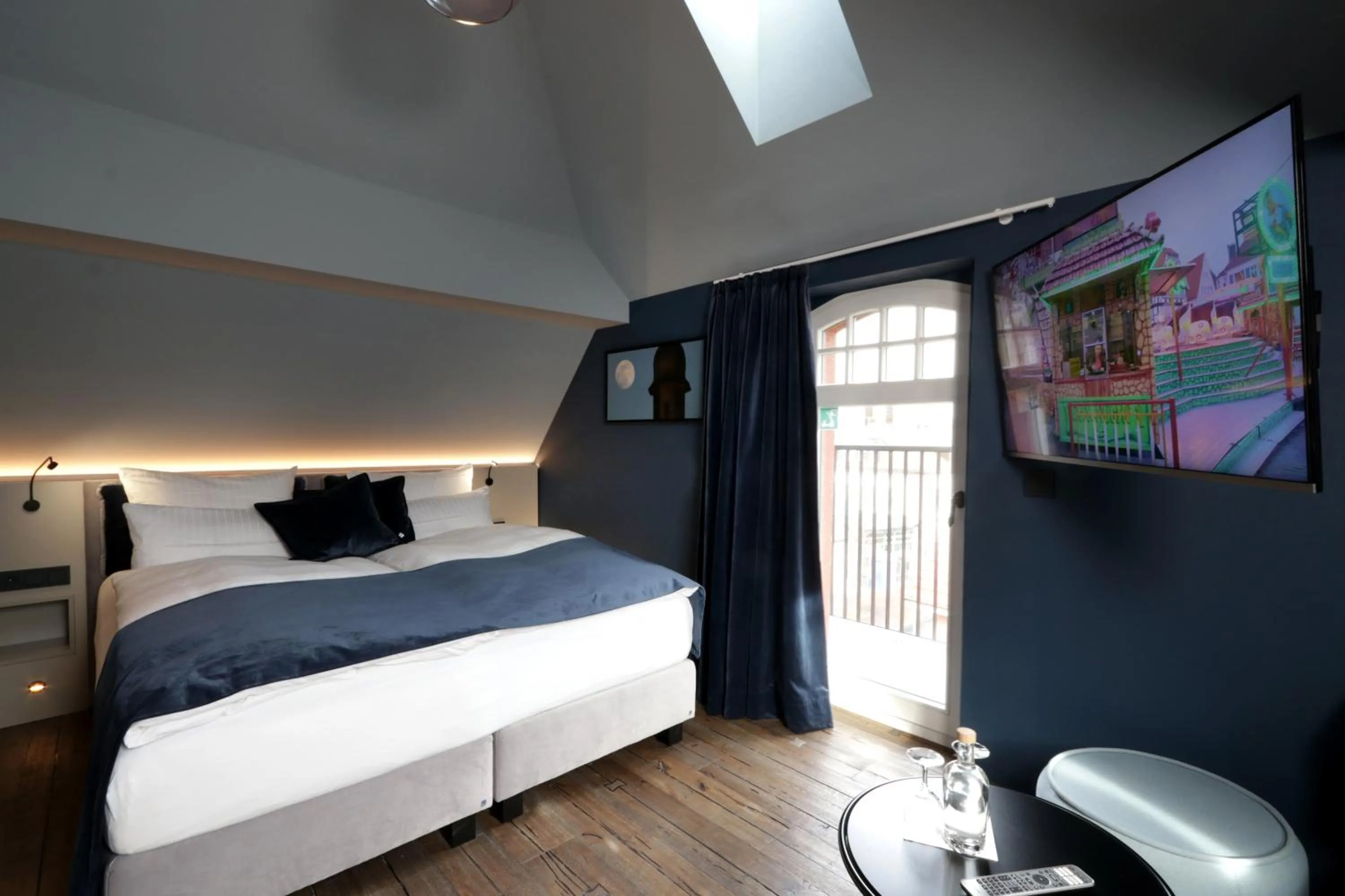 Bed in REINHARDTs HOTEL