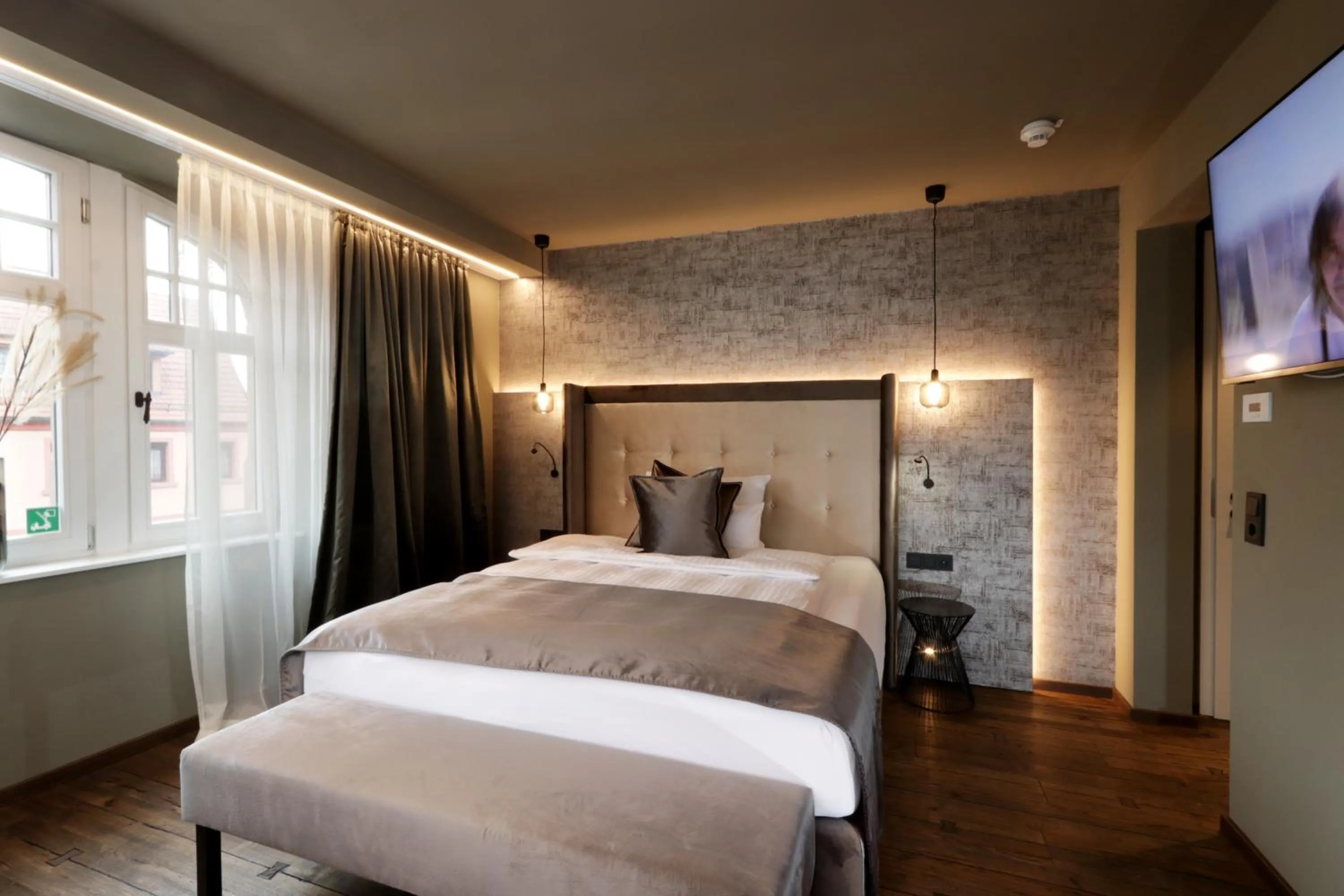 Bed in REINHARDTs HOTEL