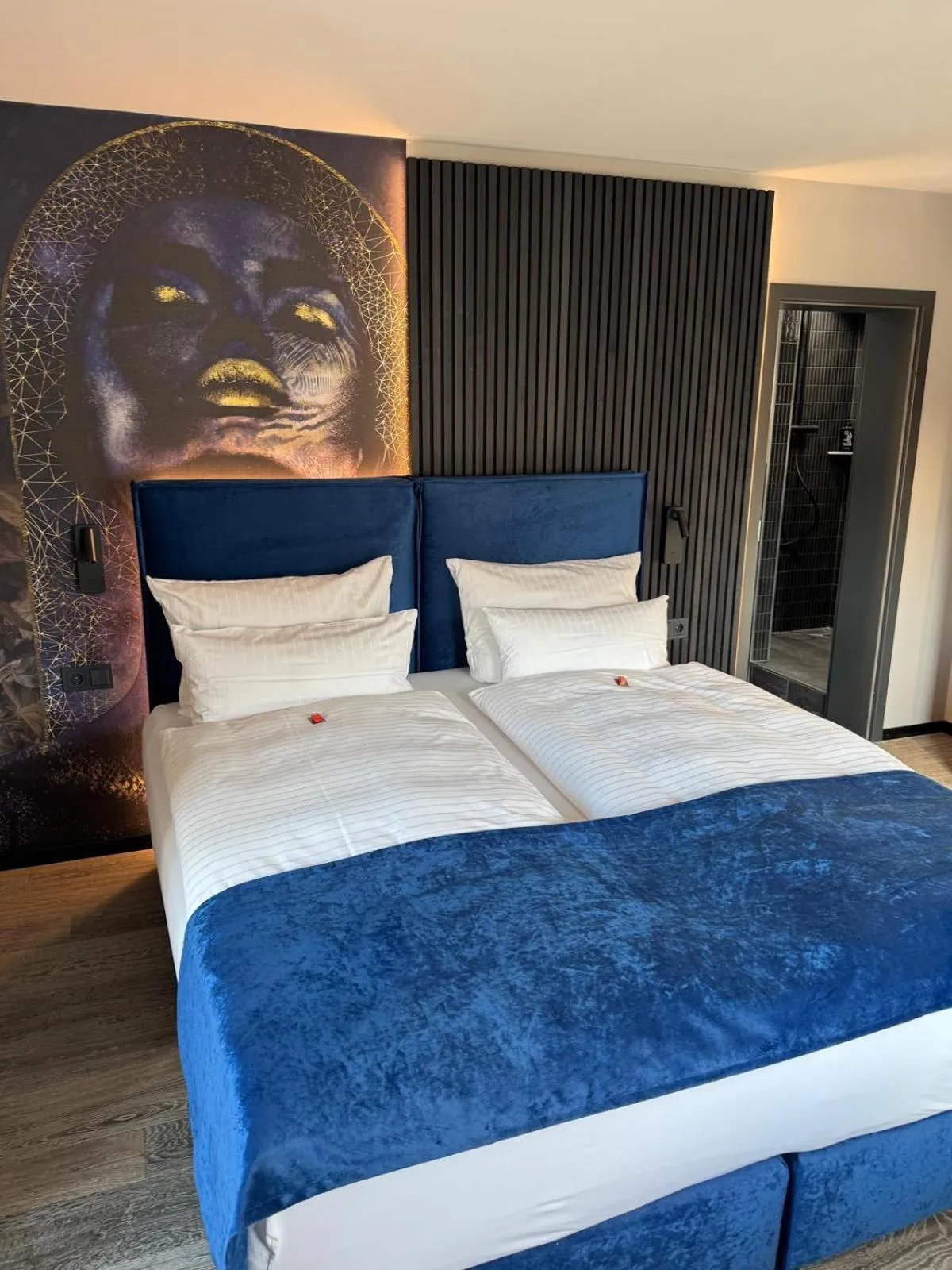 Bed in REINHARDTs HOTEL