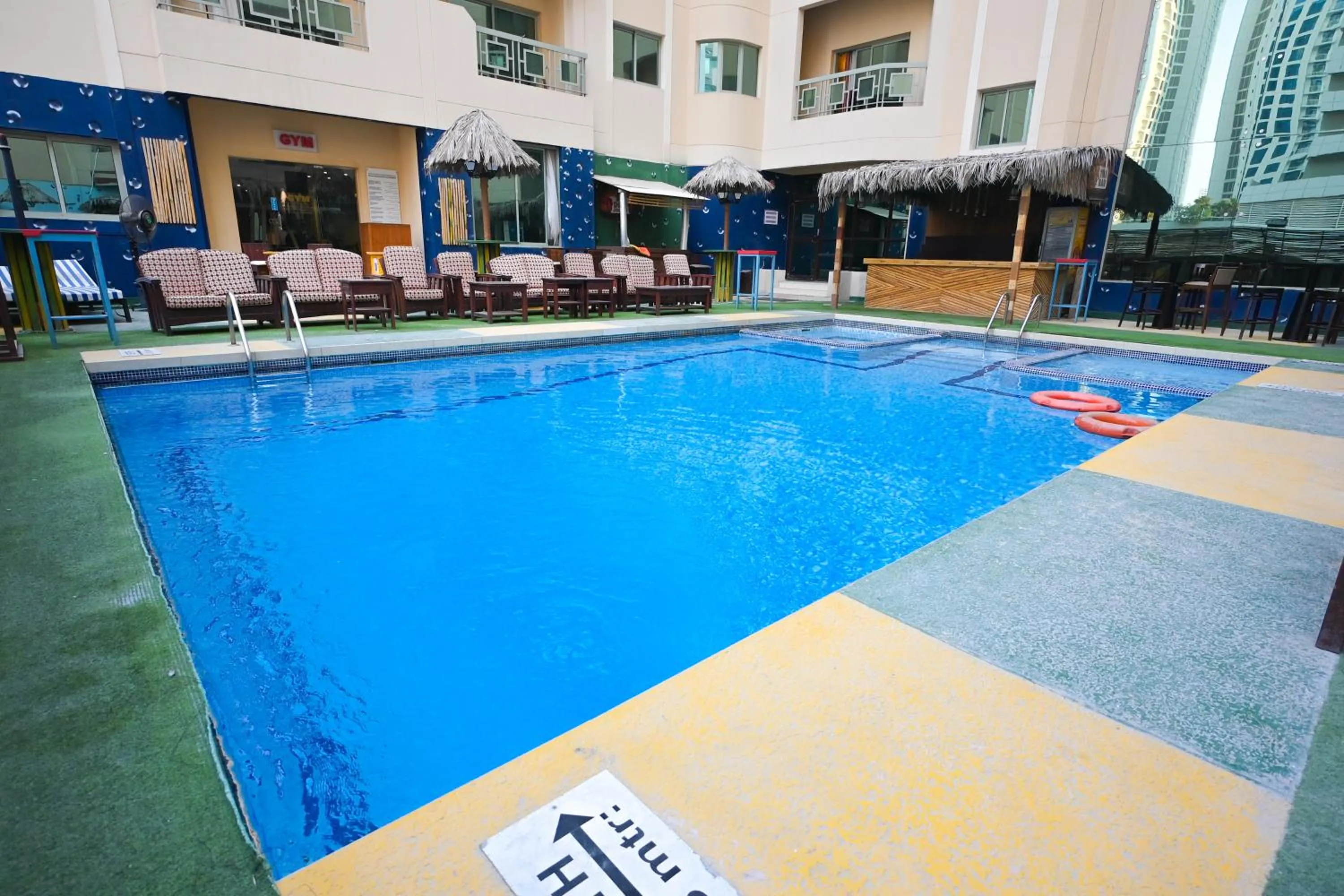 Swimming pool in Ramee Palace Hotel
