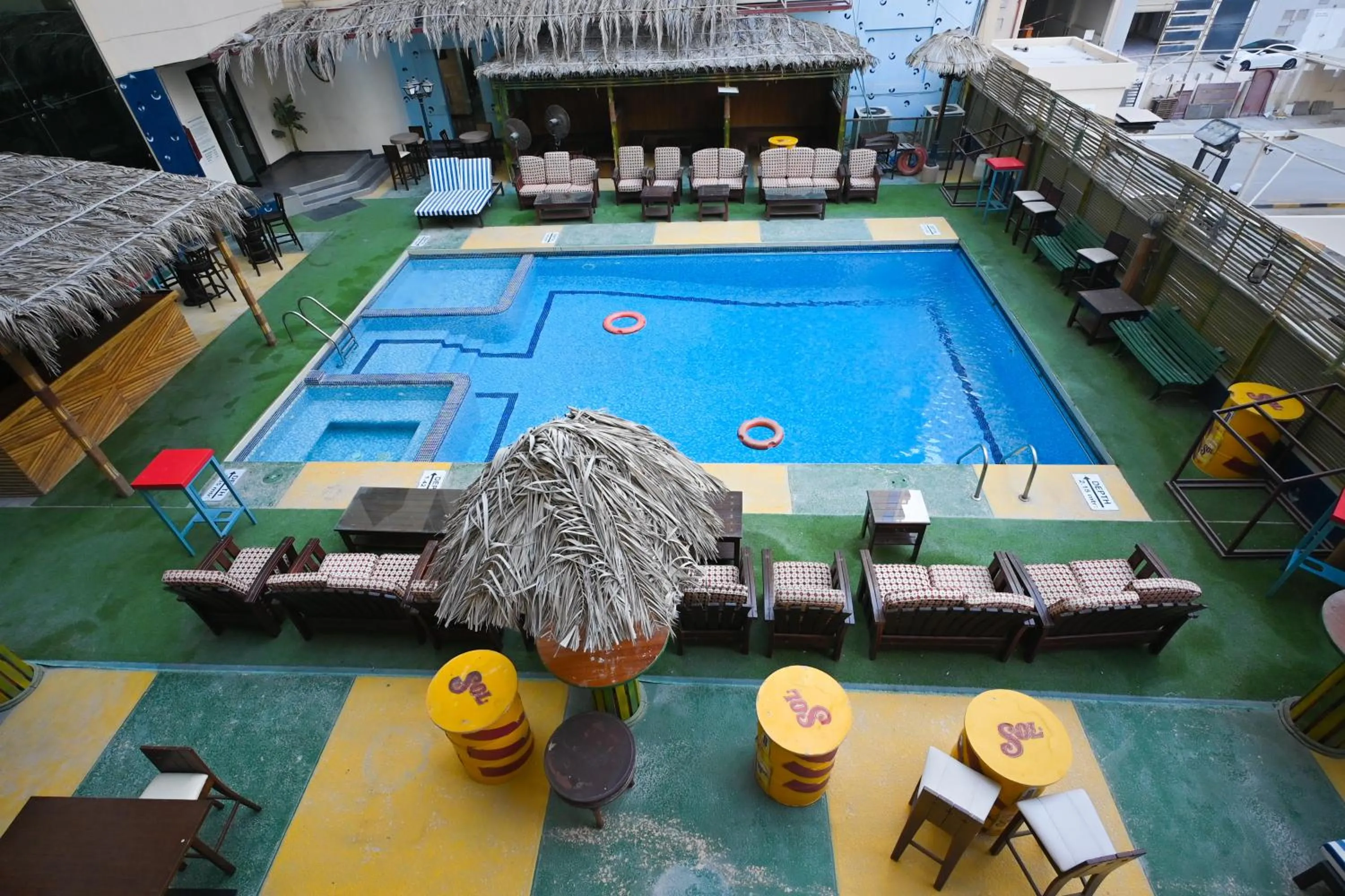 Swimming pool in Ramee Palace Hotel