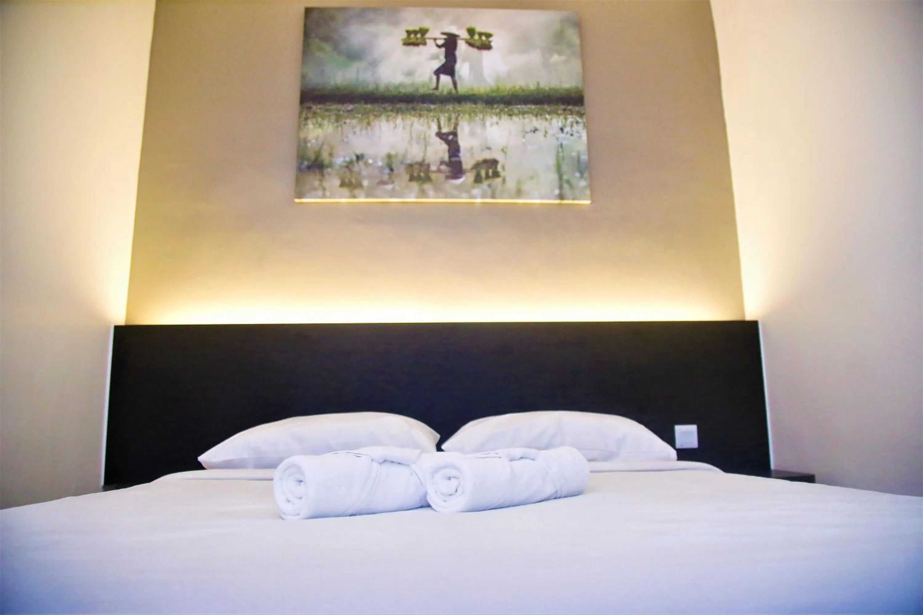 Bed in PADI PADI HOTEL