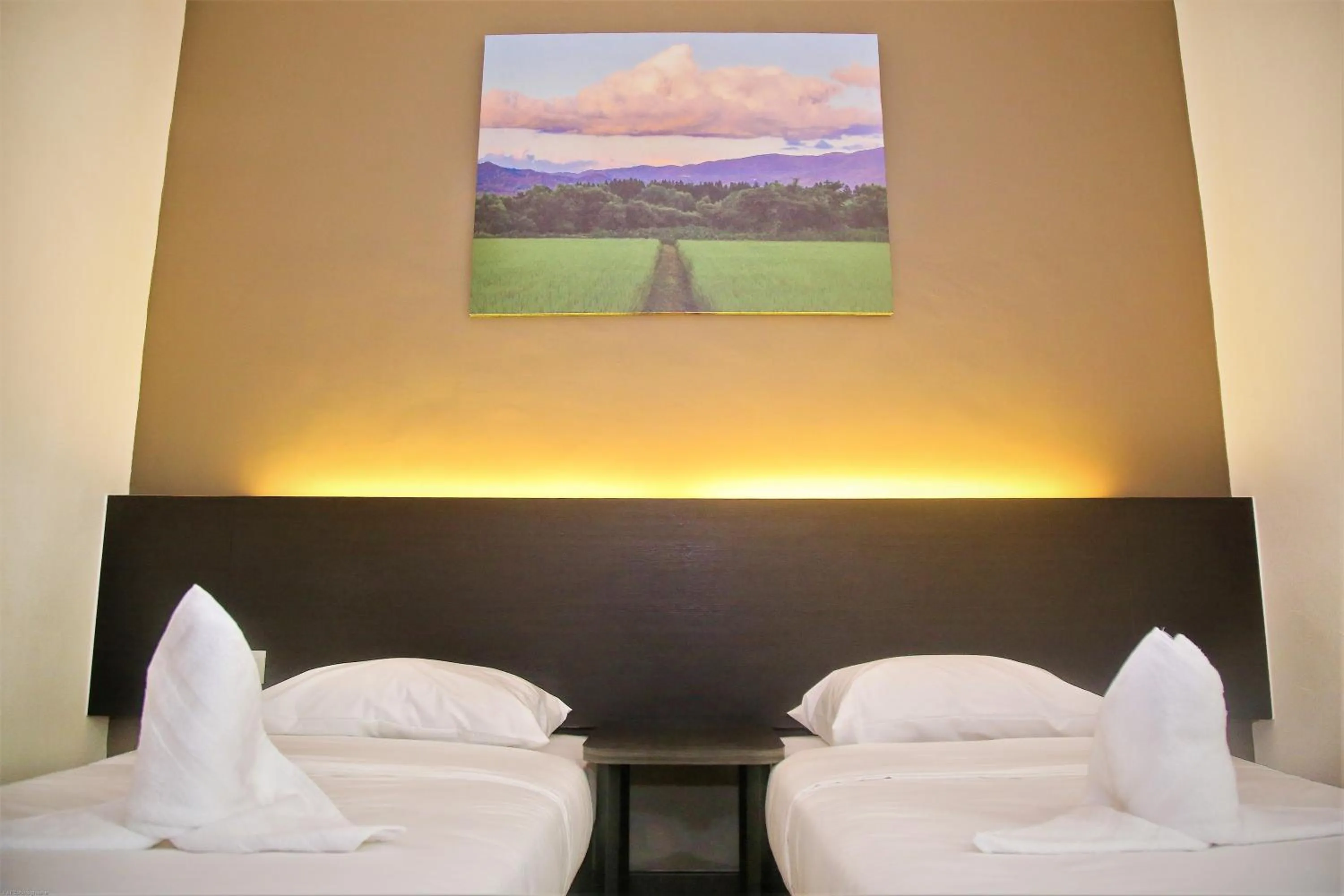 Bed in PADI PADI HOTEL