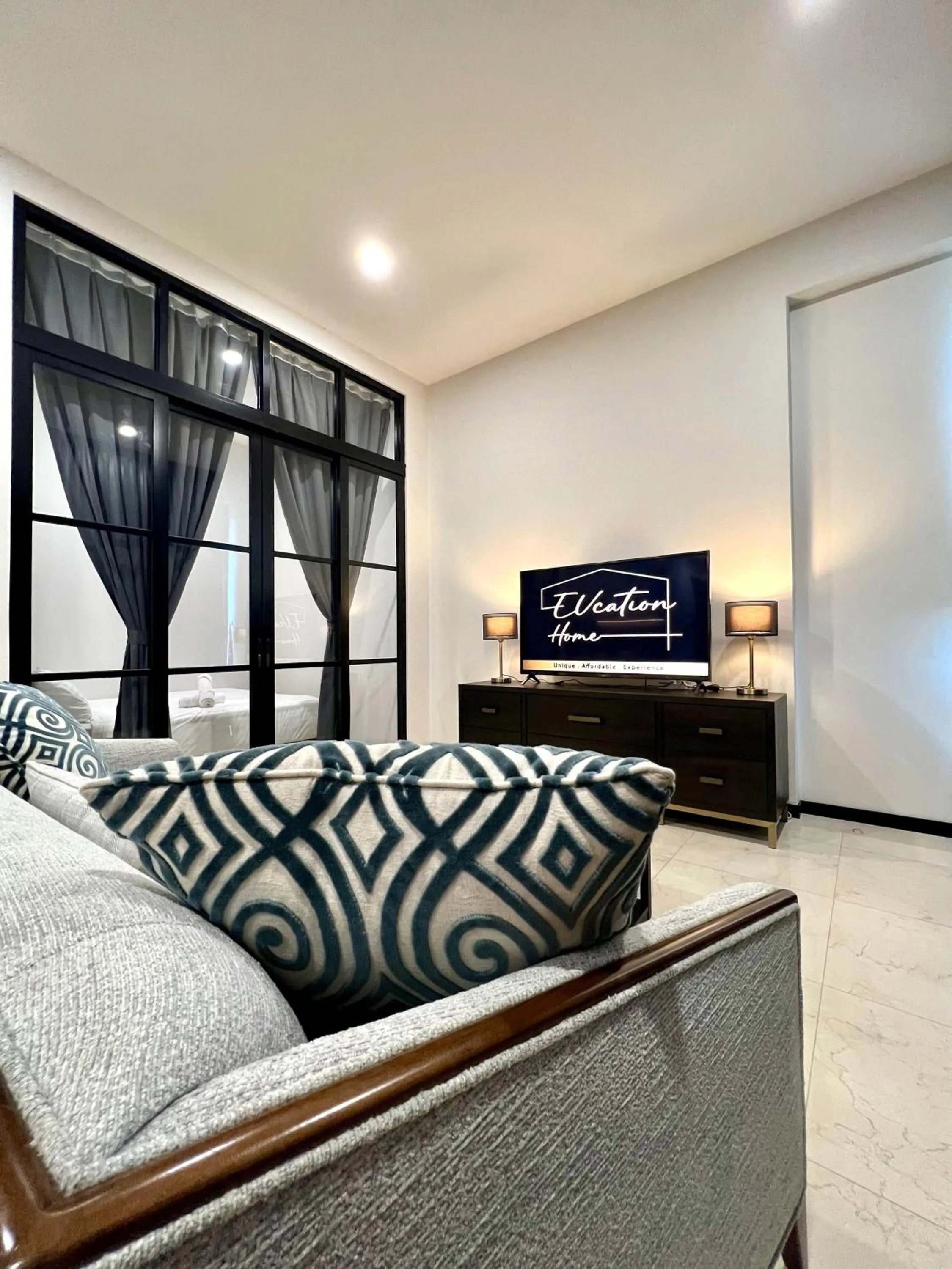 Living room, Bed in Opus Residence KL by EUcation Home