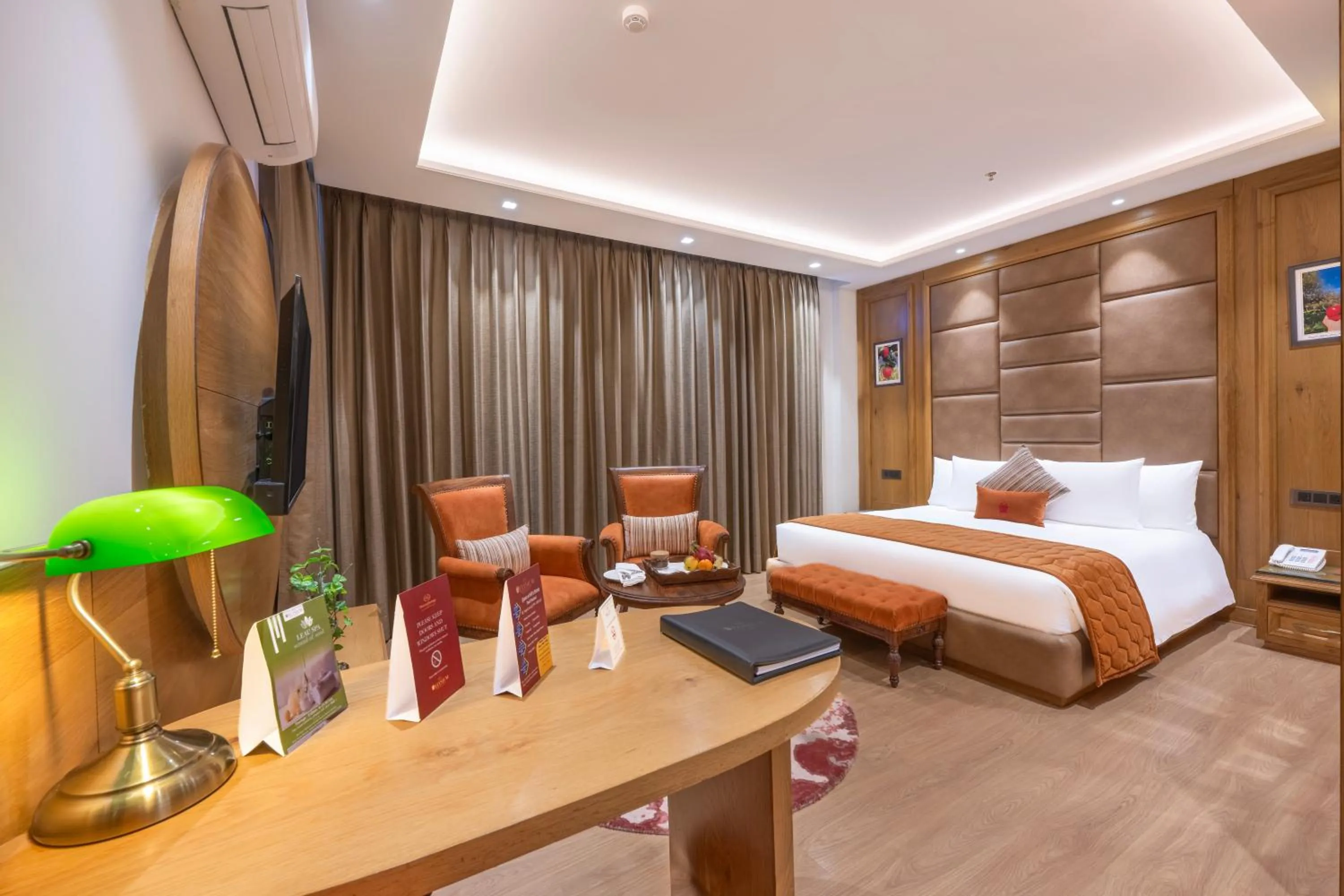 Bed in WelcomHeritage Elysium Resort & Spa