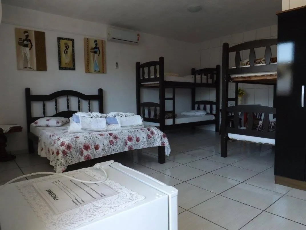 Bed in Pousada Anjo Gabriel