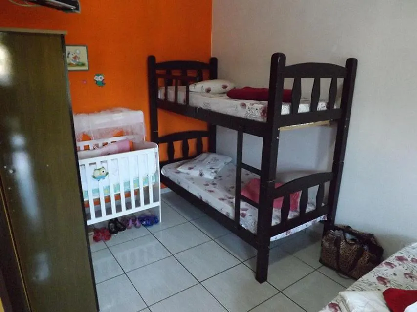 Bed in Pousada Anjo Gabriel