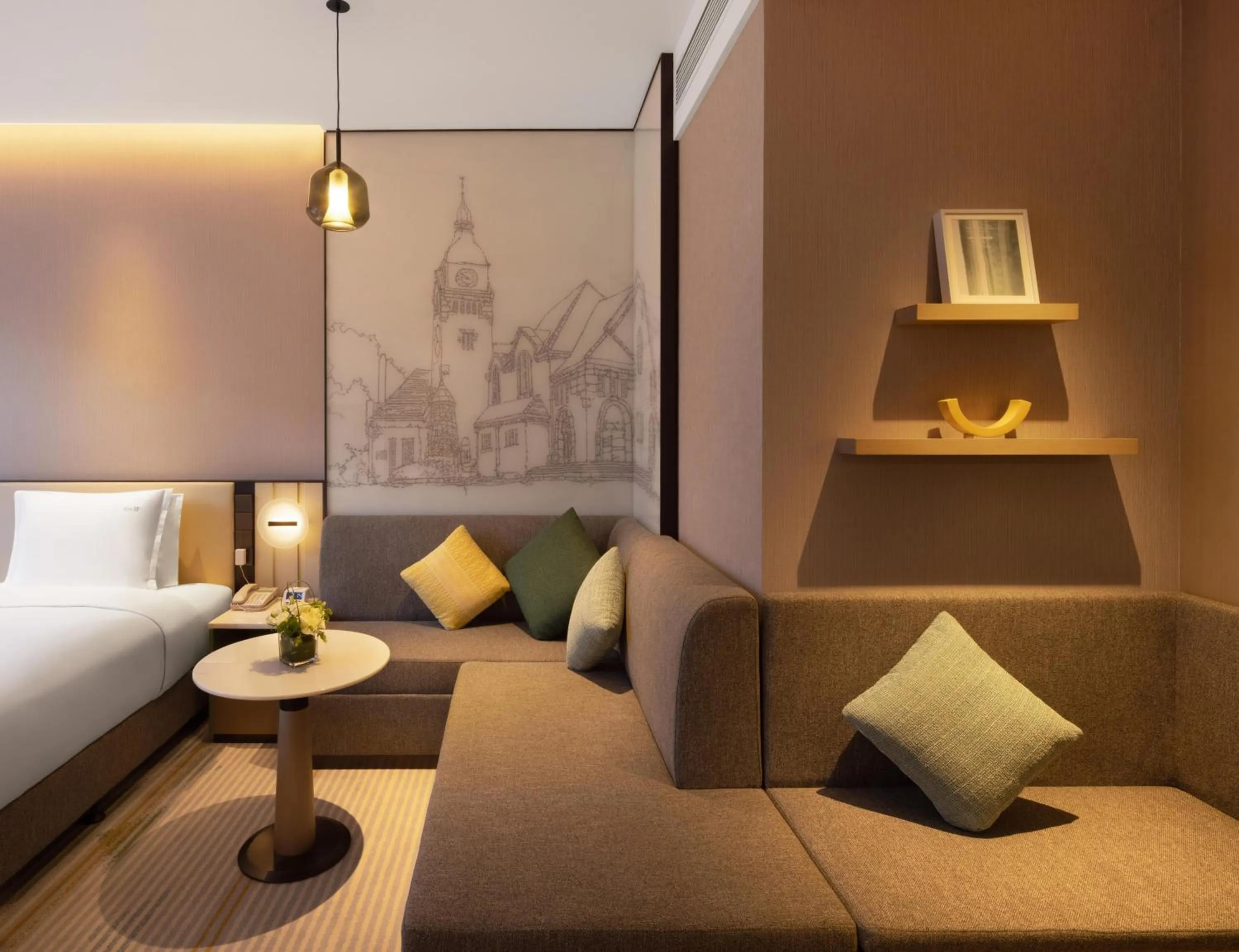 Seating area, Bed in Holiday Inn & Suites Qingdao Jinshui by IHG