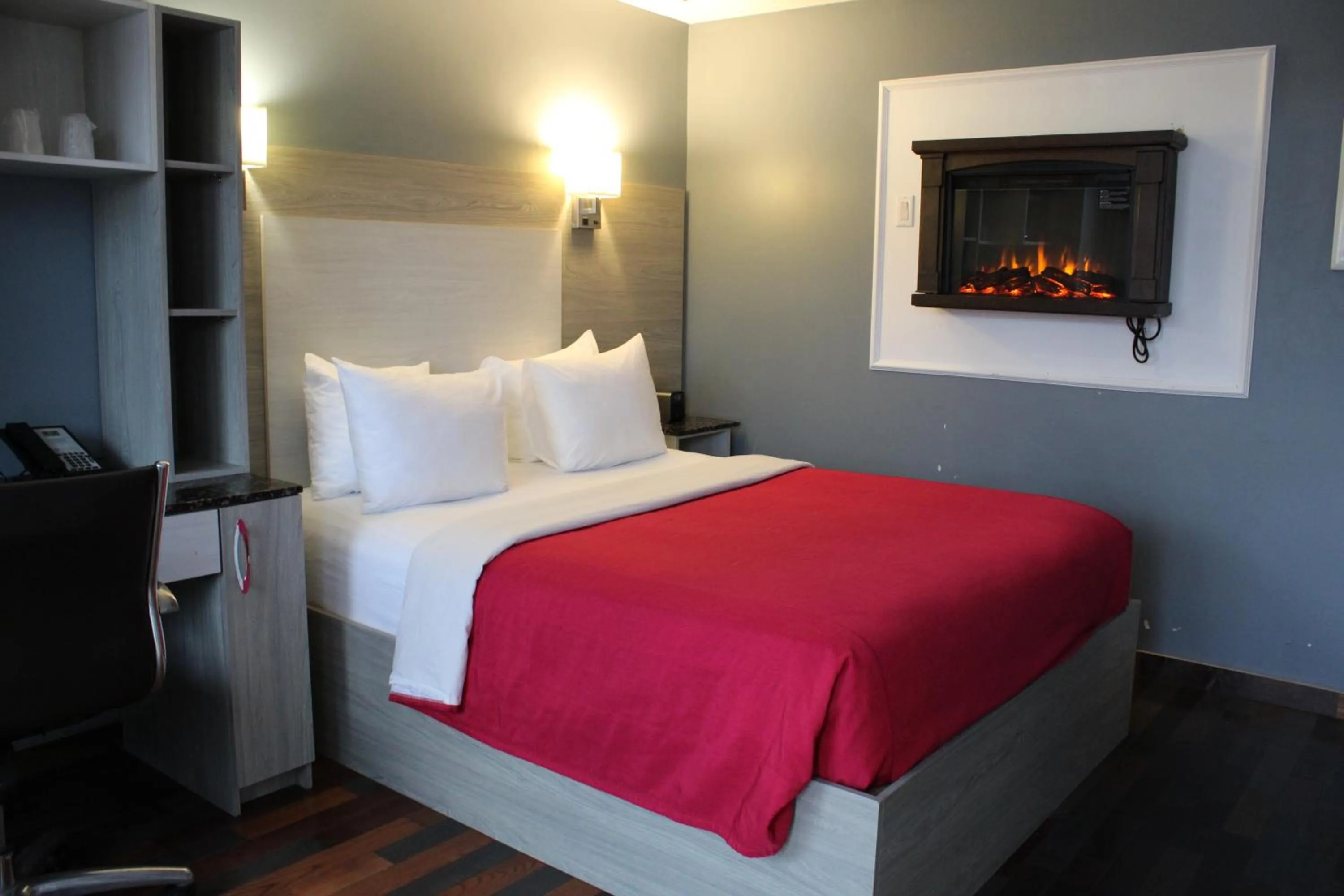 Bed in Olux Hotel-Motel-Suites