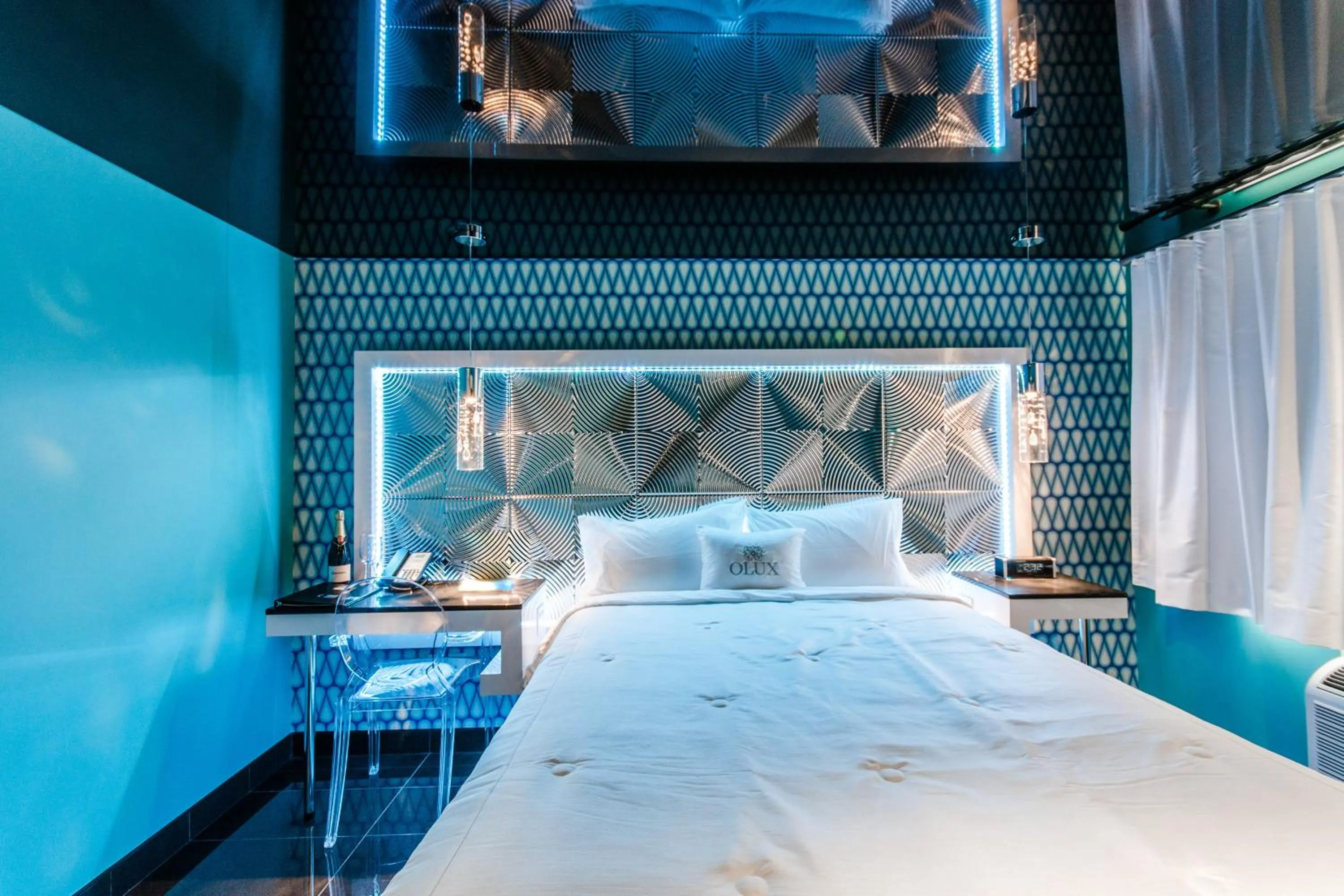 Bed in Olux Hotel-Motel-Suites