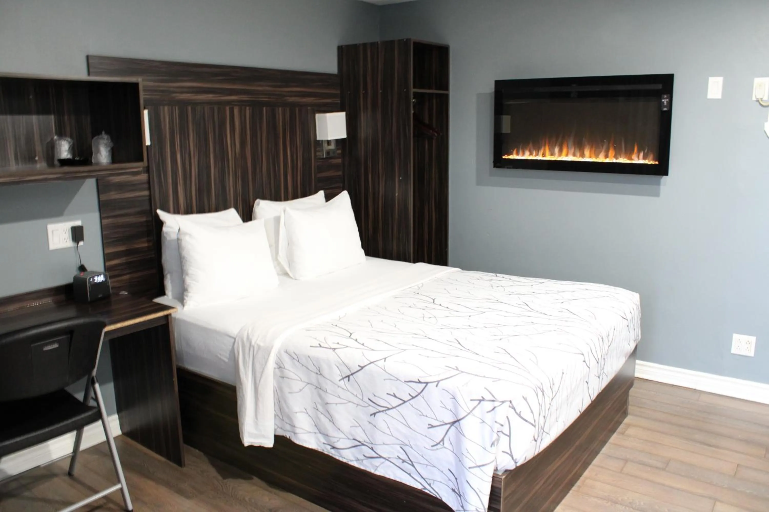 Bed in Olux Hotel-Motel-Suites