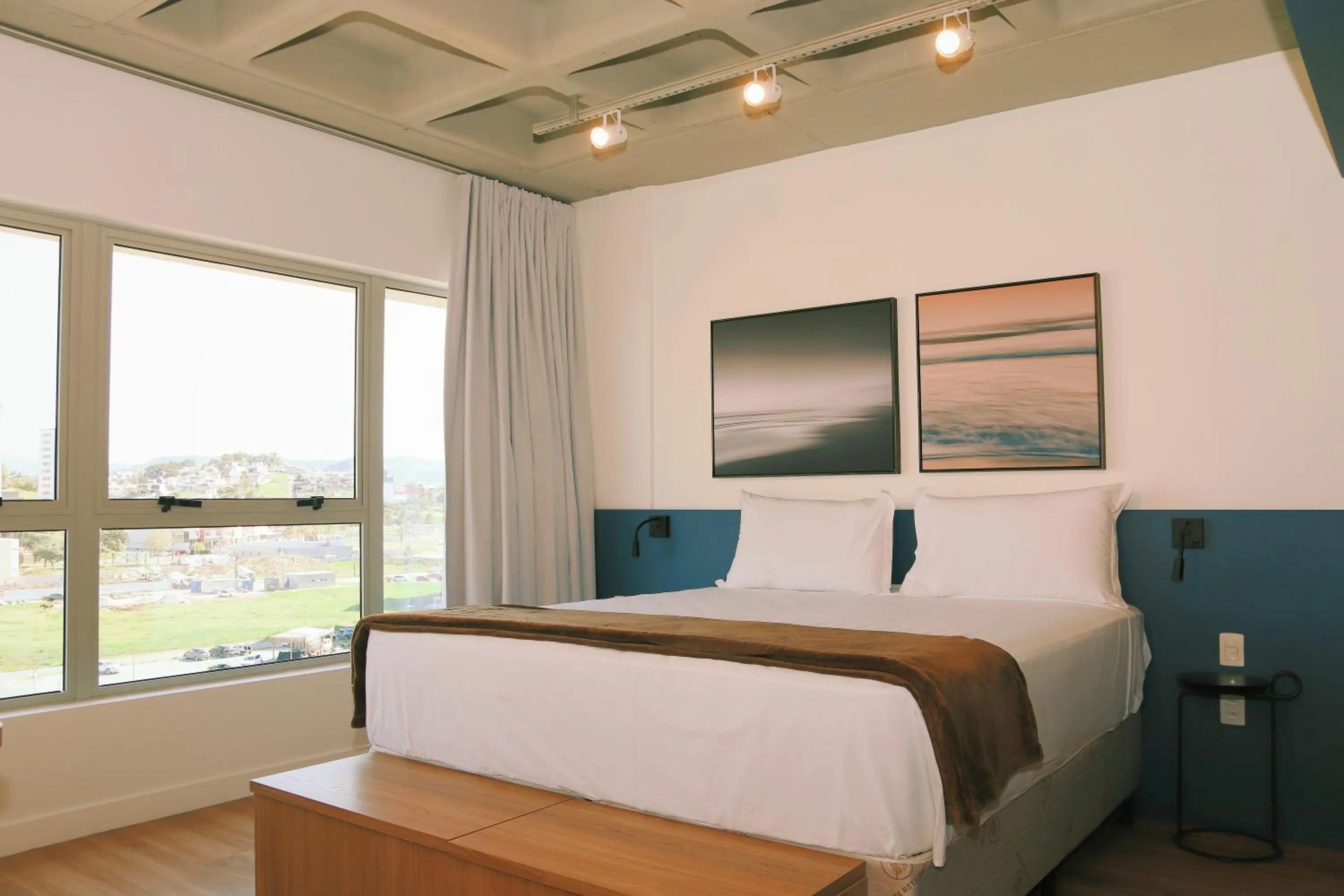 Atrium Studios by Xtay - Studio moderno em Pedra Branca - Caminhe até o Centro Empresarial e Unisul